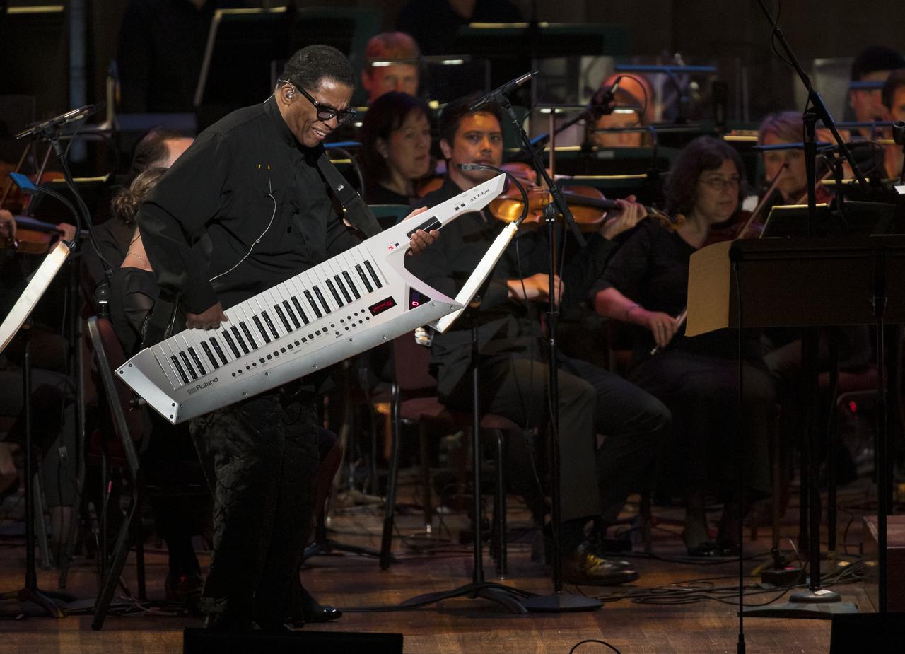 Herbie Hancock performs during the "National Symphony Orchestra Pops, Apollo 11: A 50th Anniversary, One Small Step, One Giant Leap" a program including musical acts, speakers, and images and video related to space, on Saturday, July 20, 2019 at the John F. Kennedy Center for the Performing Arts in Washington. NASA and the country are recognizing the 50th anniversary of Apollo 11, in which astronauts Neil Armstrong, Michael Collins, and Buzz Aldrin crewed the first mission to land astronauts on the Moon. Photo Credit: (NASA/Aubrey Gemignani)