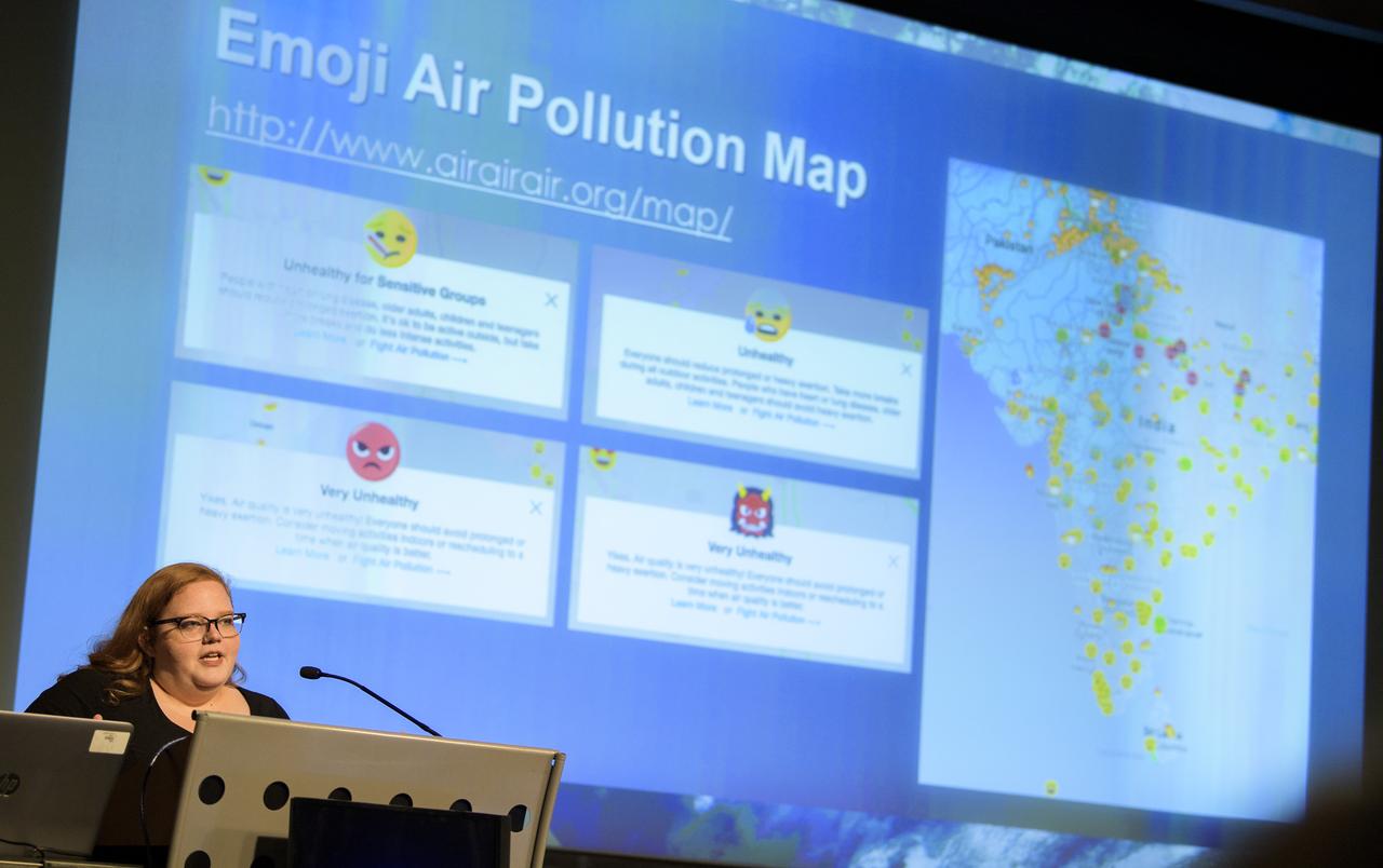 Elizabeth Hook, outreach coordinator for NASA's Applied Remote Sensing Training (ARSET) Program speaks about ARSET and its impact during the 2019 Annual Earth Science Applications Showcase, Thursday, Aug. 1, 2019 at NASA Headquarters in Washington, DC. Every summer students and young professionals from NASA’s Applied Sciences’ DEVELOP National Program come to NASA Headquarters and present their research projects. DEVELOP is a training and development program where students work on Earth science research projects, mentored by science advisers from NASA and partner agencies, and extend research results to local communities. Photo Credit: (NASA/Joel Kowsky)