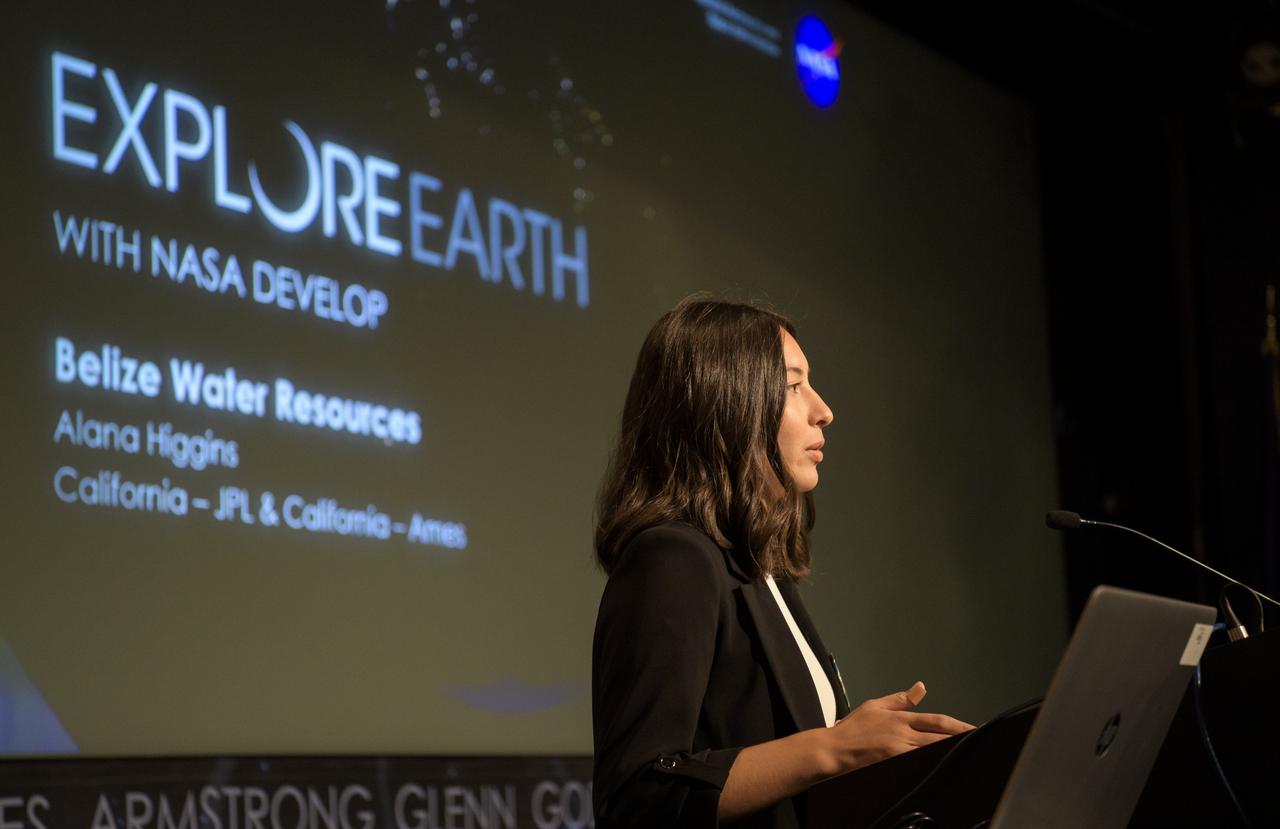 Alana Higgins speaks about water resources in Belize during the 2019 Annual Earth Science Applications Showcase, Thursday, Aug. 1, 2019 at NASA Headquarters in Washington, DC. Every summer students and young professionals from NASA’s Applied Sciences’ DEVELOP National Program come to NASA Headquarters and present their research projects. DEVELOP is a training and development program where students work on Earth science research projects, mentored by science advisers from NASA and partner agencies, and extend research results to local communities. Photo Credit: (NASA/Joel Kowsky)