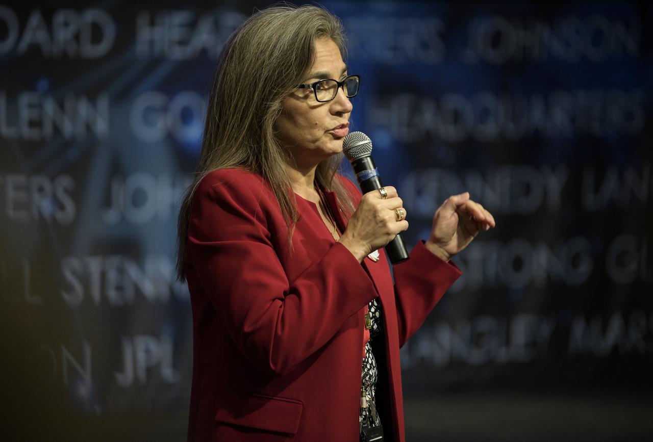 Sandra Cauffman, acting Director of the Earth Sciences Division of the Science Mission Directorate at NASA Headquarters, speaks during the 2019 Annual Earth Science Applications Showcase, Thursday, Aug. 1, 2019 at NASA Headquarters in Washington, DC. Every summer students and young professionals from NASA’s Applied Sciences’ DEVELOP National Program come to NASA Headquarters and present their research projects. DEVELOP is a training and development program where students work on Earth science research projects, mentored by science advisers from NASA and partner agencies, and extend research results to local communities. Photo Credit: (NASA/Joel Kowsky)