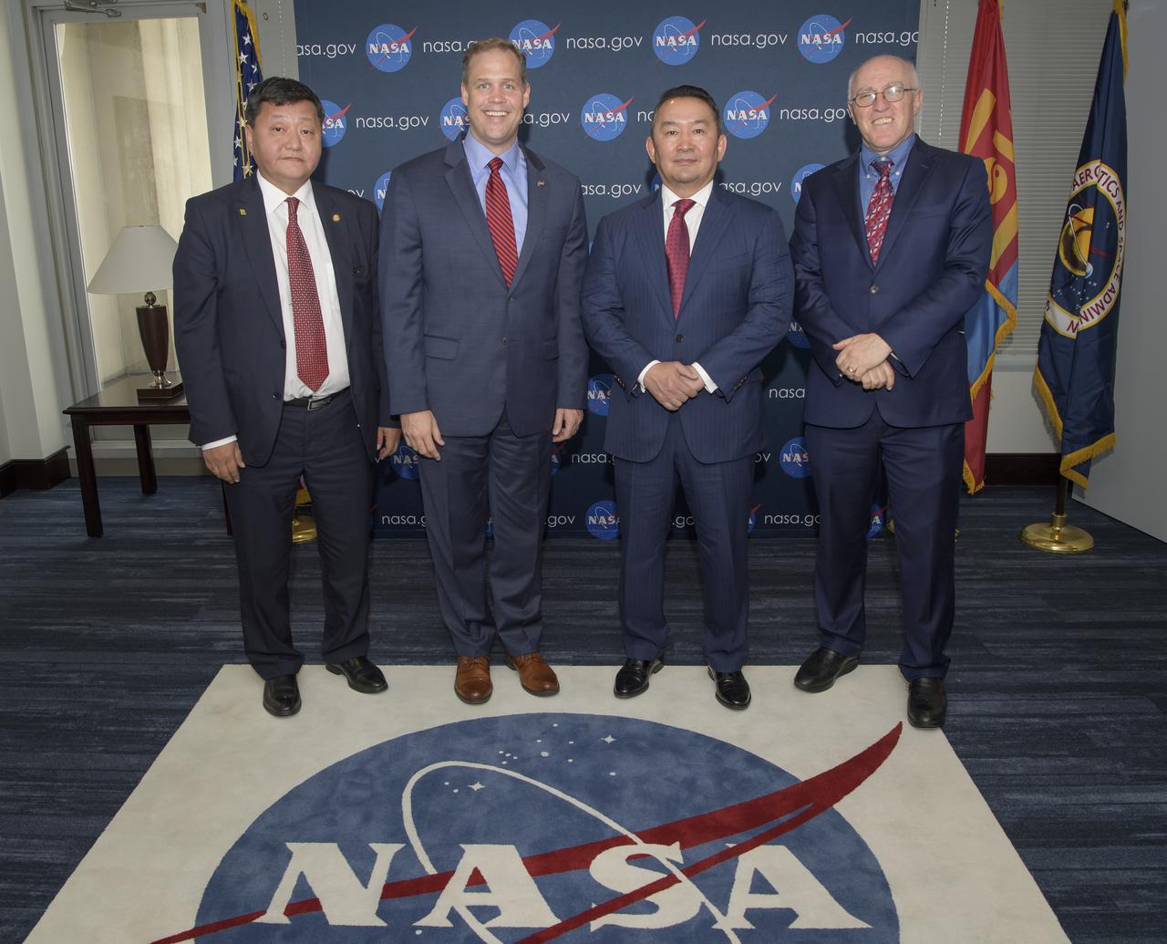 Mongolia's ambassador to the United States Otgonbayar Yondon, left, NASA Administrator Jim Bridenstine, Mongolia's President Khaltmaagiin Battulga, and U.S. Ambassador to Mongolia Michael Klecheski, right, pose for a photograph during a courtesy visit, Thursday, Aug. 1, 2019 at NASA Headquarters in Washington. Photo Credit: (NASA/Bill Ingalls)