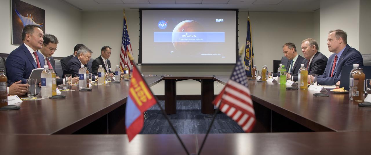 Mongolia's President Khaltmaagiin Battulga, left, and NASA Administrator Jim Bridenstine, talk during a courtesy visit, Thursday, Aug. 1, 2019 at NASA Headquarters in Washington. Photo Credit: (NASA/Bill Ingalls)