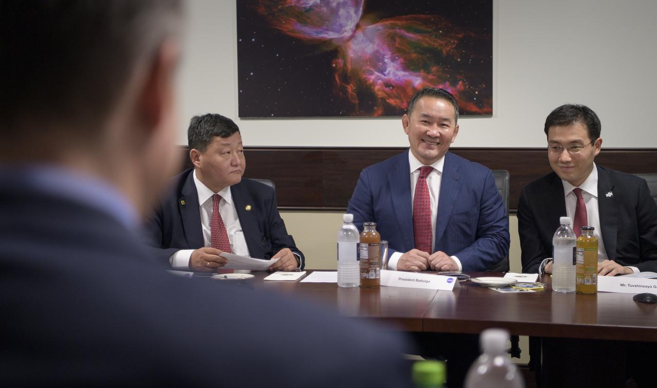 Mongolia's President Khaltmaagiin Battulga, center, talks to NASA Administrator Jim Bridenstine during a courtesy visit, Thursday, Aug. 1, 2019 at NASA Headquarters in Washington. Photo Credit: (NASA/Bill Ingalls)