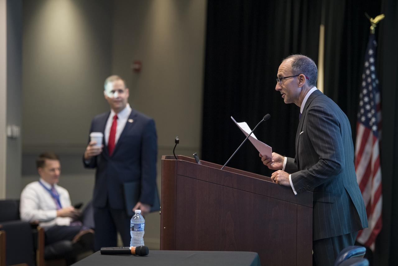 NASA Administrator Jim Bridenstine, standing left, is introduced by President and CEO of the Challenger Center, Lance Bush, just before giving keynote remarks at the Challenger Center Annual Conference, Wednesday, August 14, 2019 at the Lockheed Martin Global Vision Center in Arlington, VA. Photo Credit: (NASA/Aubrey Gemignani)