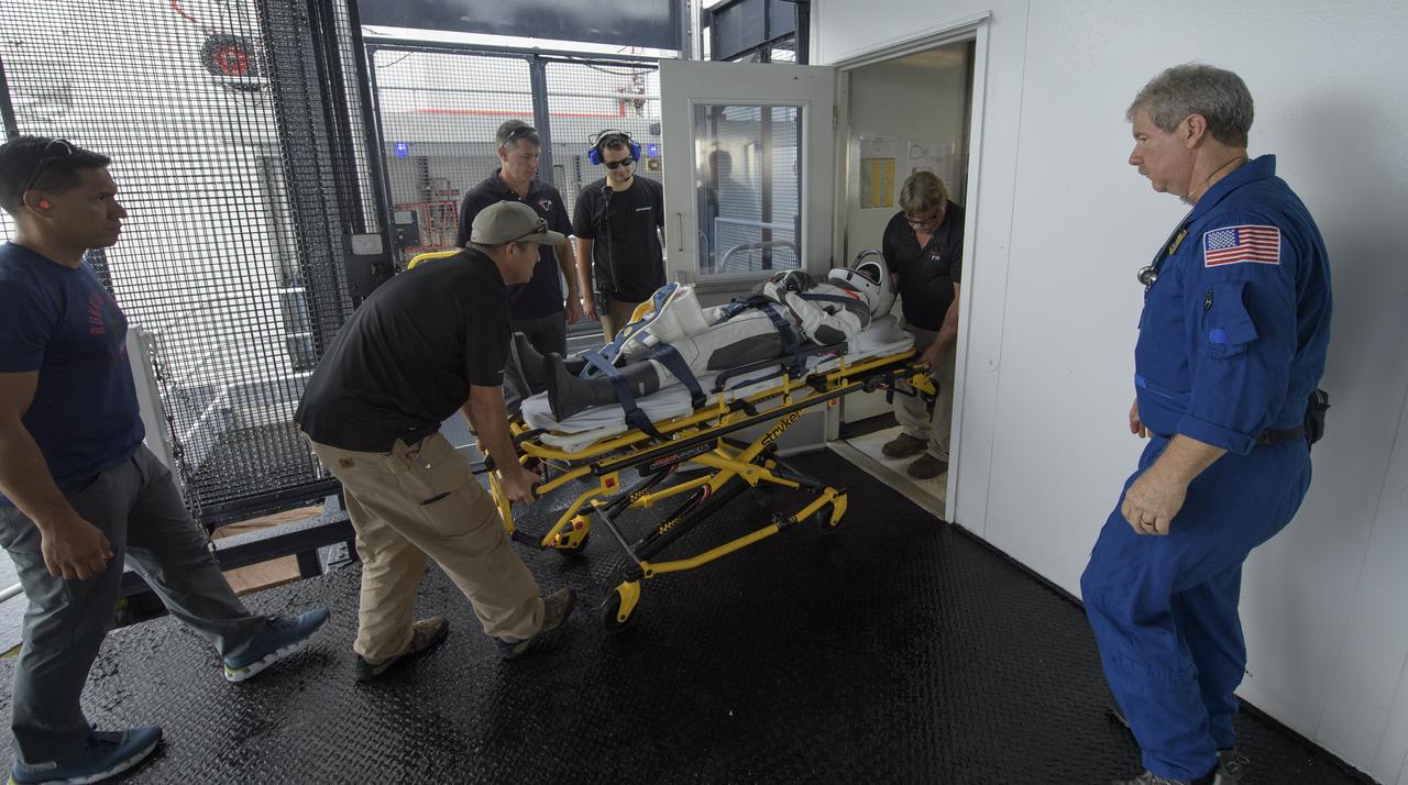 Teams from NASA and SpaceX practice procedures for medical emergency evacuation onboard the GO Searcher ship, Friday, August 15, 2019 in the Atlantic Ocean off the coast of Cape Canaveral, Florida. SpaceX will use the GO Searcher ship during the Demo-2 mission to recover NASA astronauts returning from the International Space Station in their Crew Dragon spacecraft. Photo Credit: (NASA/Bill Ingalls)