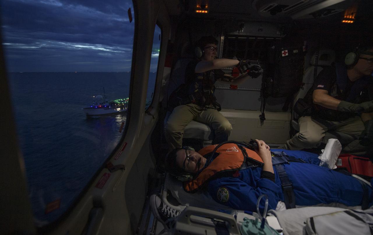 Teams from NASA and SpaceX practice medical emergency evacuations from the GO Searcher ship via helicopter, Friday, August 15, 2019 in the Atlantic Ocean off the coast of Cape Canaveral, Florida. The teams gathered to refine procedures for emergency situations. SpaceX will use the GO Searcher ship during the Demo-2 mission to recover NASA astronauts returning from the International Space Station in their Crew Dragon spacecraft. Photo Credit: (NASA/Bill Ingalls)