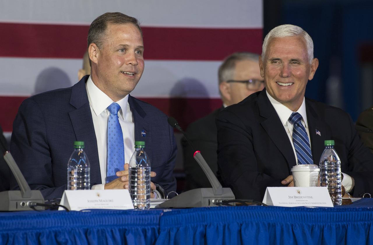 Vice President Mike Pence looks on as NASA Administrator Jim Bridestine speaks during the sixth meeting of the National Space Council, Tuesday, Aug. 20, 2019 at the Smithsonian National Air and Space Museum's Steven F. Udvar-Hazy Center in Chantilly, Va. Chaired by the Vice President, the council's role is to advise the President regarding national space policy and strategy, and review the nation's long-range goals for space activities. Photo Credit: (NASA/Aubrey Gemignani)