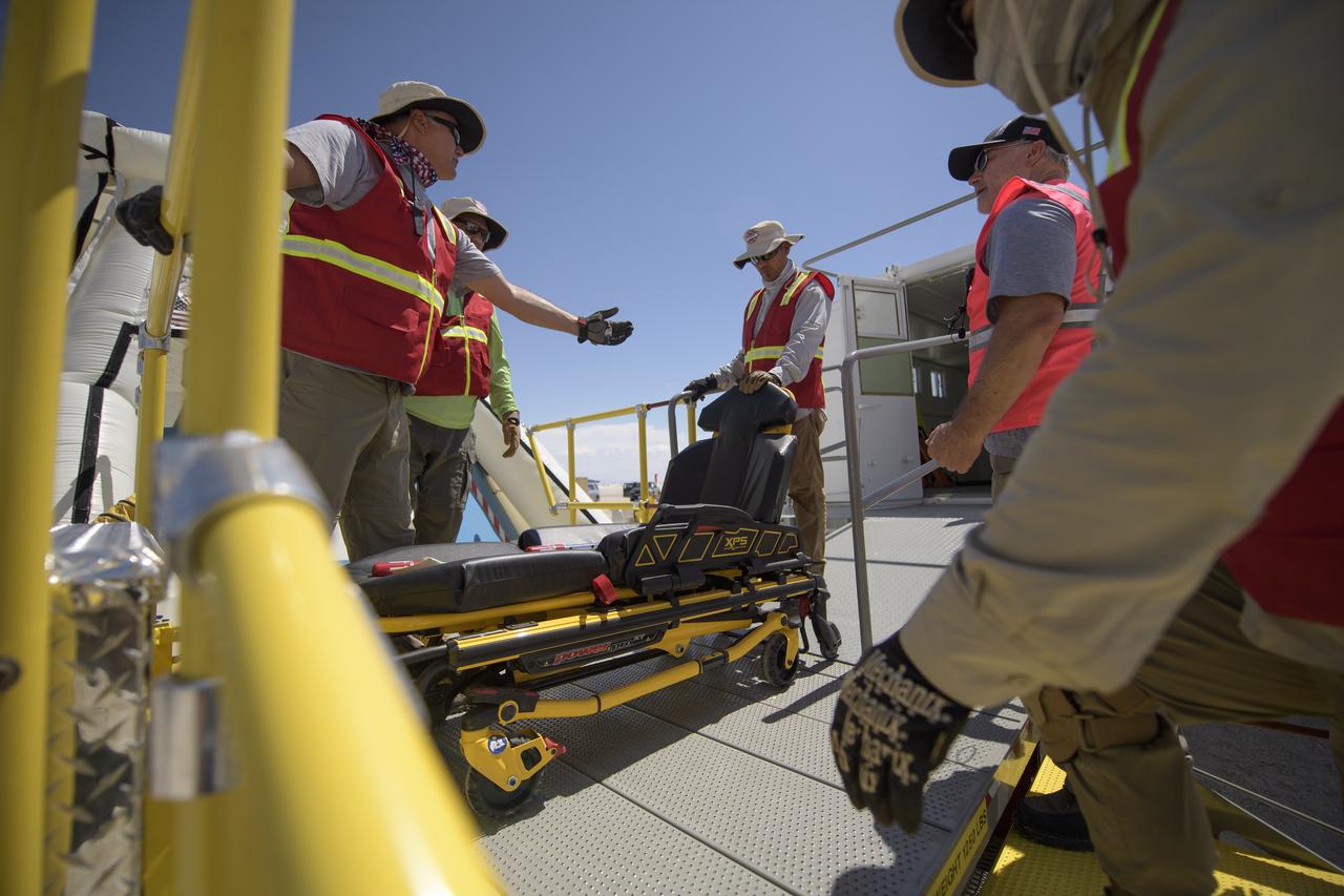 Teams from NASA, Boeing and the White Sands Missile Range, rehearse landing and crew extraction from Boeing’s CST-100 Starliner, which will be used to carry humans to the International Space Station, on Monday, Sept. 9, 2019 at the White Sands Missile Range outside Las Cruces, New Mexico. Using a convoy of vehicles Boeing uses to recover their spacecraft after landing and a boiler plate test article of the Starliner capsule, the teams worked through the steps necessary to safe the vehicle and get future crew members out of the Starliner to return home. NASA astronauts Mike Fincke and Nicole Mann and Boeing astronaut Chris Ferguson will fly to the space station aboard the Starliner for the Boeing Crew Flight Test mission. Photo Credit: (NASA/Bill Ingalls)