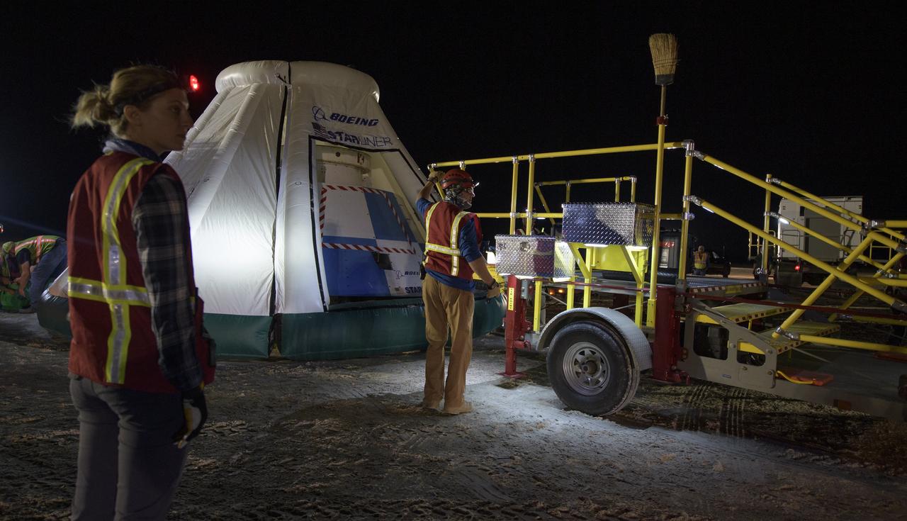 Teams from NASA, Boeing and the White Sands Missile Range, rehearse landing and crew extraction from Boeing’s CST-100 Starliner, which will be used to carry humans to the International Space Station, on Tuesday, Sept. 10, 2019 at the White Sands Missile Range outside Las Cruces, New Mexico. Using a convoy of vehicles Boeing uses to recover their spacecraft after landing and a boiler plate test article of the Starliner capsule, the teams worked through the steps necessary to safe the vehicle and get future crew members out of the Starliner to return home. NASA astronauts Mike Fincke and Nicole Mann and Boeing astronaut Chris Ferguson will fly to the space station aboard the Starliner for the Boeing Crew Flight Test mission. Photo Credit: (NASA/Bill Ingalls)