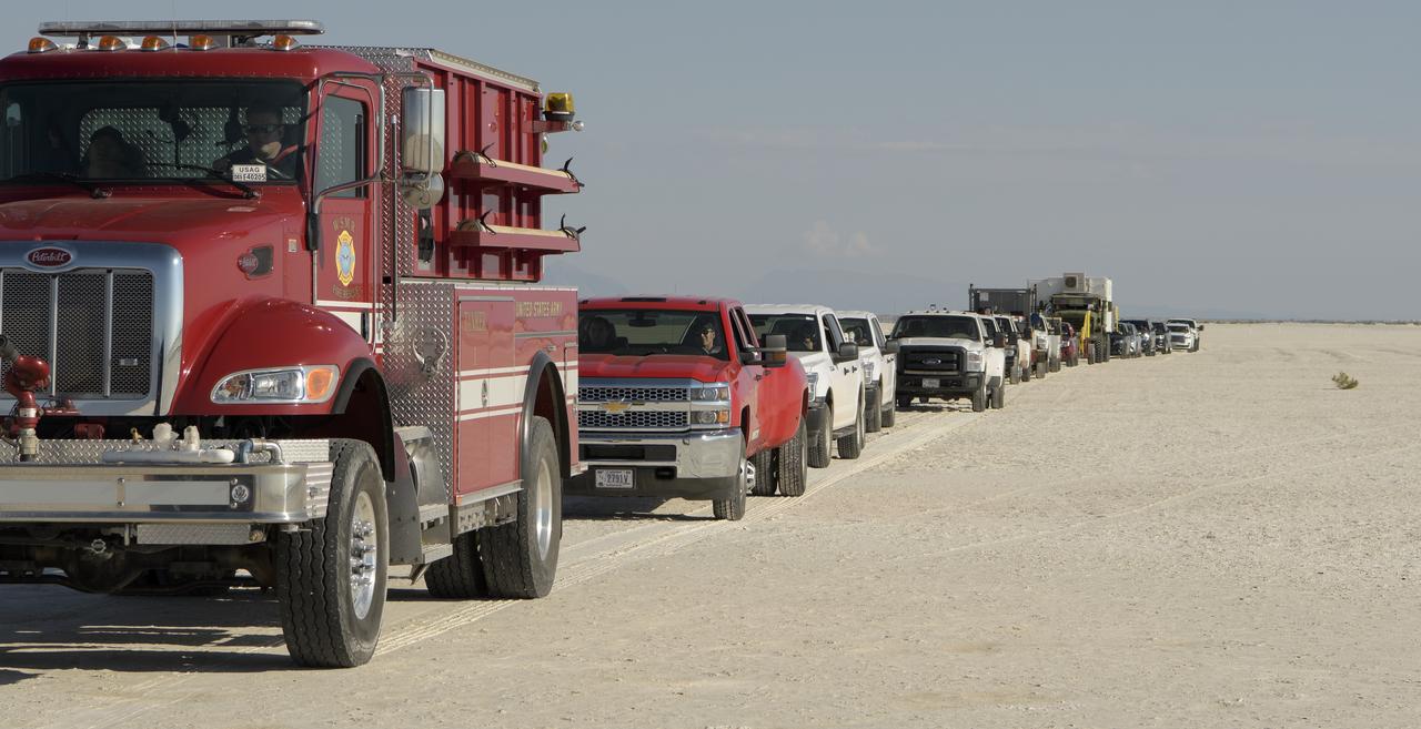 Teams from NASA, Boeing and the White Sands Missile Range, rehearse landing and crew extraction from Boeing’s CST-100 Starliner, which will be used to carry humans to the International Space Station, on Tuesday, Sept. 10, 2019 at the White Sands Missile Range outside Las Cruces, New Mexico. Using a convoy of vehicles Boeing uses to recover their spacecraft after landing and a boiler plate test article of the Starliner capsule, the teams worked through the steps necessary to safe the vehicle and get future crew members out of the Starliner to return home. NASA astronauts Mike Fincke and Nicole Mann and Boeing astronaut Chris Ferguson will fly to the space station aboard the Starliner for the Boeing Crew Flight Test mission. Photo Credit: (NASA/Bill Ingalls)