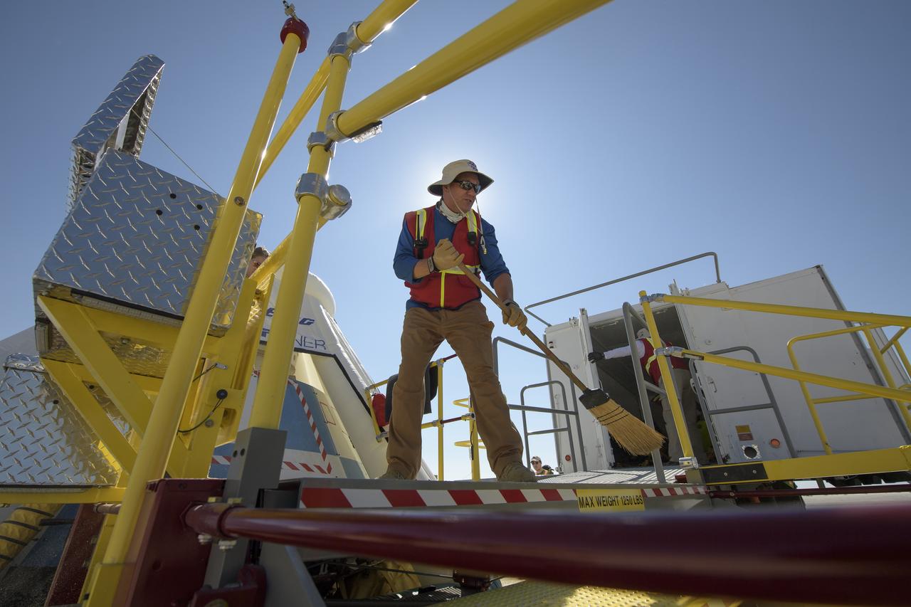 Teams from NASA, Boeing and the White Sands Missile Range, rehearse landing and crew extraction from Boeing’s CST-100 Starliner, which will be used to carry humans to the International Space Station, on Tuesday, Sept. 10, 2019 at the White Sands Missile Range outside Las Cruces, New Mexico. Using a convoy of vehicles Boeing uses to recover their spacecraft after landing and a boiler plate test article of the Starliner capsule, the teams worked through the steps necessary to safe the vehicle and get future crew members out of the Starliner to return home. NASA astronauts Mike Fincke and Nicole Mann and Boeing astronaut Chris Ferguson will fly to the space station aboard the Starliner for the Boeing Crew Flight Test mission. Photo Credit: (NASA/Bill Ingalls)