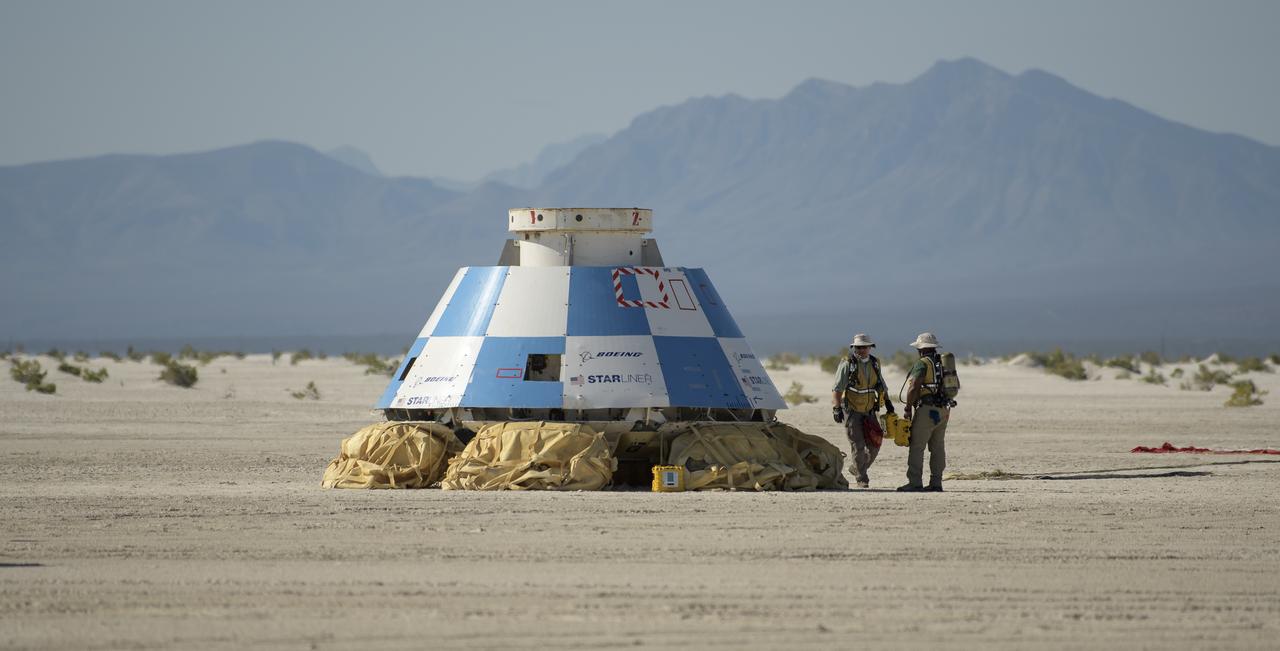 Teams from NASA, Boeing and the White Sands Missile Range, rehearse landing and crew extraction from Boeing’s CST-100 Starliner, which will be used to carry humans to the International Space Station, on Wednesday, Sept. 11, 2019 at the White Sands Missile Range outside Las Cruces, New Mexico. Using a convoy of vehicles Boeing uses to recover their spacecraft after landing and a boiler plate test article of the Starliner capsule, the teams worked through the steps necessary to safe the vehicle and get future crew members out of the Starliner to return home. NASA astronauts Mike Fincke and Nicole Mann and Boeing astronaut Chris Ferguson will fly to the space station aboard the Starliner for the Boeing Crew Flight Test mission. Photo Credit: (NASA/Bill Ingalls)