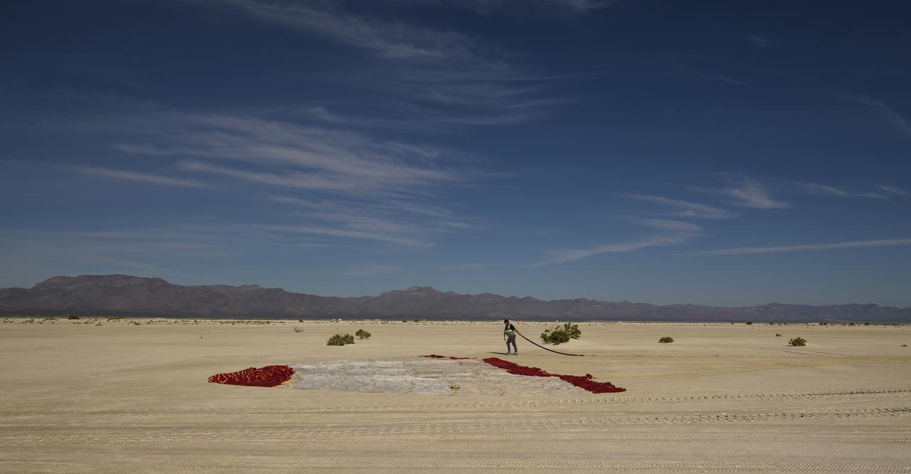 Teams from NASA, Boeing and the White Sands Missile Range, rehearse landing and crew extraction from Boeing’s CST-100 Starliner, which will be used to carry humans to the International Space Station, on Thursday, Sept. 12, 2019 at the White Sands Missile Range outside Las Cruces, New Mexico. Using a convoy of vehicles Boeing uses to recover their spacecraft after landing and a boiler plate test article of the Starliner capsule, the teams worked through the steps necessary to safe the vehicle and get future crew members out of the Starliner to return home. NASA astronauts Mike Fincke and Nicole Mann and Boeing astronaut Chris Ferguson will fly to the space station aboard the Starliner for the Boeing Crew Flight Test mission. Photo Credit: (NASA/Bill Ingalls)