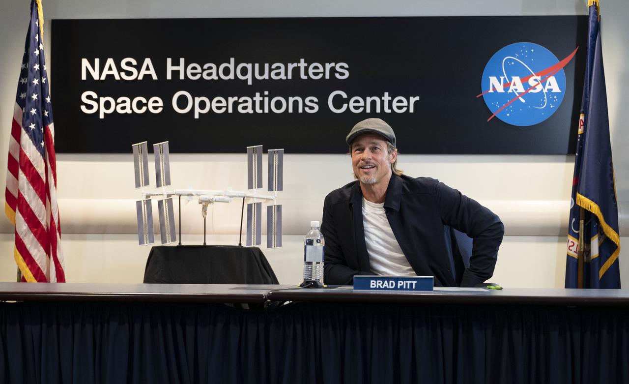Actor Brad Pitt speaks with NASA astronaut Nick Hague who is onboard the International Space Station, Monday, Sept. 16, 2019 from the Space Operations Center at NASA Headquarters in Washington. Pitt, who stars as an astronaut in his latest film “Ad Astra,” spoke with Hague about what it’s like to live and work aboard the orbiting laboratory. Photo Credit: (NASA/Joel Kowsky)