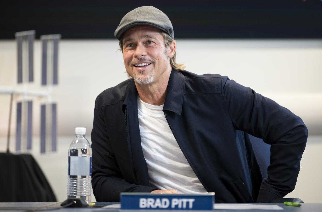 Actor Brad Pitt speaks with NASA astronaut Nick Hague who is onboard the International Space Station, Monday, Sept. 16, 2019 from the Space Operations Center at NASA Headquarters in Washington. Pitt, who stars as an astronaut in his latest film “Ad Astra,” spoke with Hague about what it’s like to live and work aboard the orbiting laboratory. Photo Credit: (NASA/Joel Kowsky)
