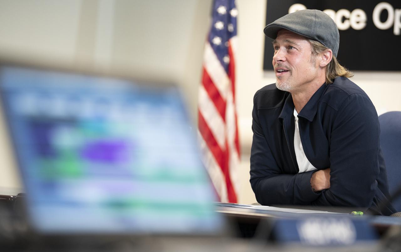 Actor Brad Pitt speaks with NASA astronaut Nick Hague who is onboard the International Space Station, Monday, Sept. 16, 2019 from the Space Operations Center at NASA Headquarters in Washington. Pitt, who stars as an astronaut in his latest film “Ad Astra,” spoke with Hague about what it’s like to live and work aboard the orbiting laboratory. Photo Credit: (NASA/Joel Kowsky)