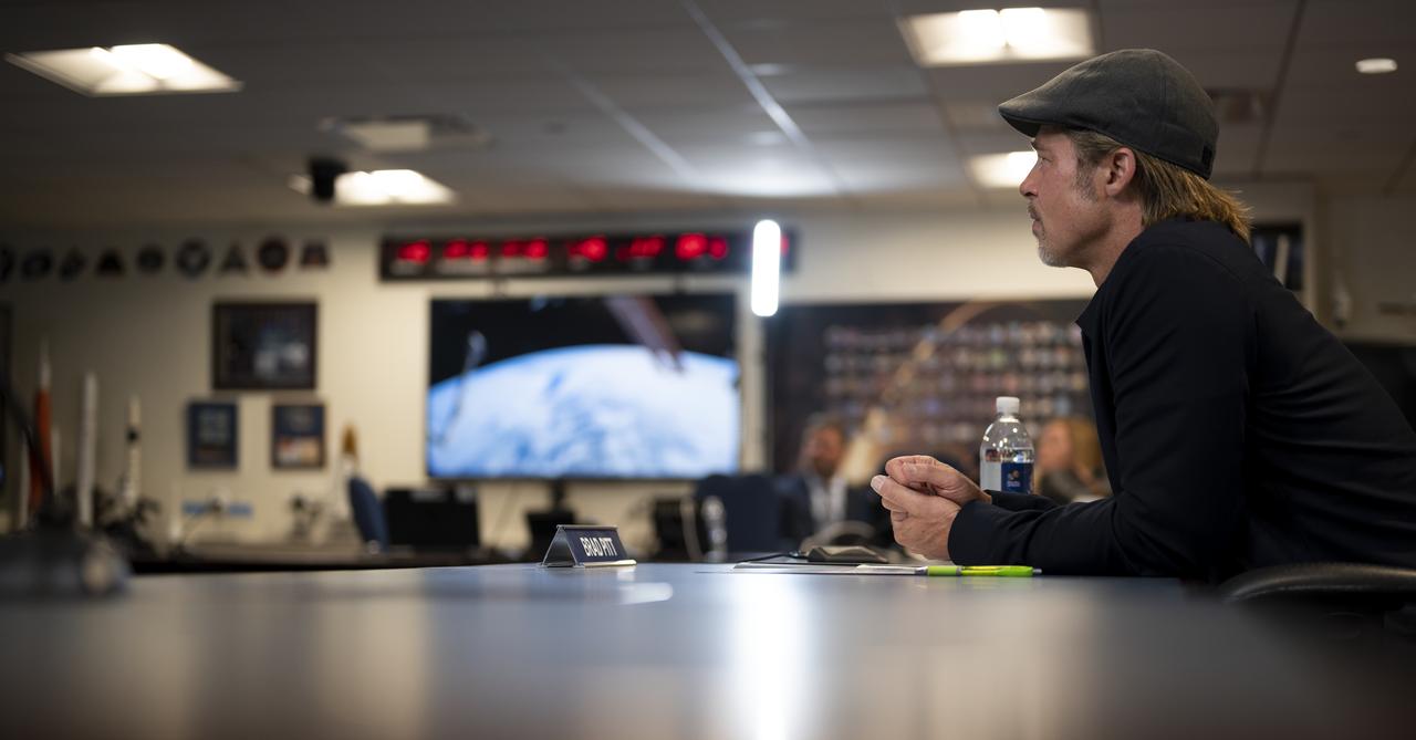 Actor Brad Pitt speaks with NASA astronaut Nick Hague who is onboard the International Space Station, Monday, Sept. 16, 2019 from the Space Operations Center at NASA Headquarters in Washington. Pitt, who stars as an astronaut in his latest film “Ad Astra,” spoke with Hague about what it’s like to live and work aboard the orbiting laboratory. Photo Credit: (NASA/Joel Kowsky)