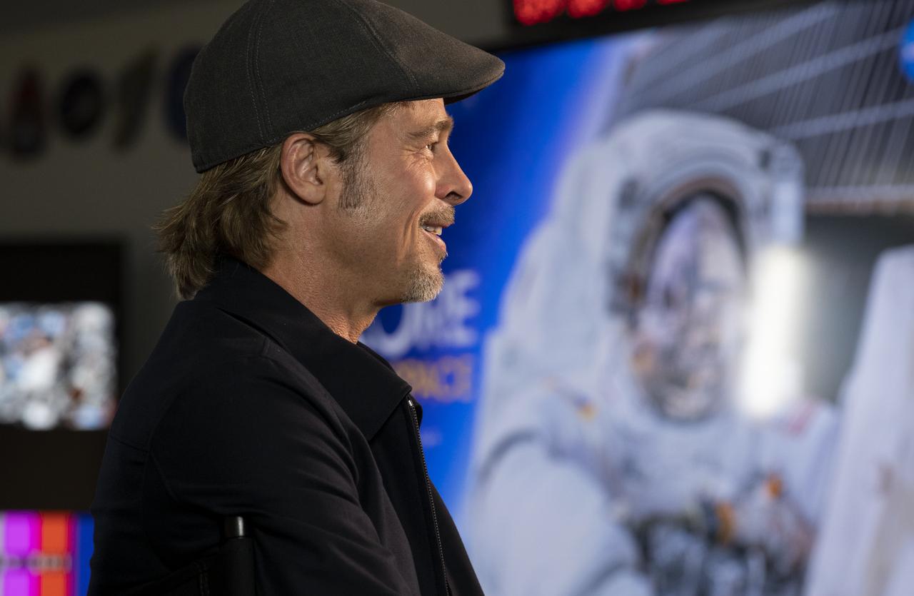 Actor Brad Pitt is seen during an interview, Monday, Sept. 16, 2019 from the Space Operations Center at NASA Headquarters in Washington. Pitt, who stars as an astronaut in his latest film “Ad Astra,” spoke with NASA astronaut Nick Hague about what it’s like to live and work aboard the orbiting laboratory. Photo Credit: (NASA/Joel Kowsky)