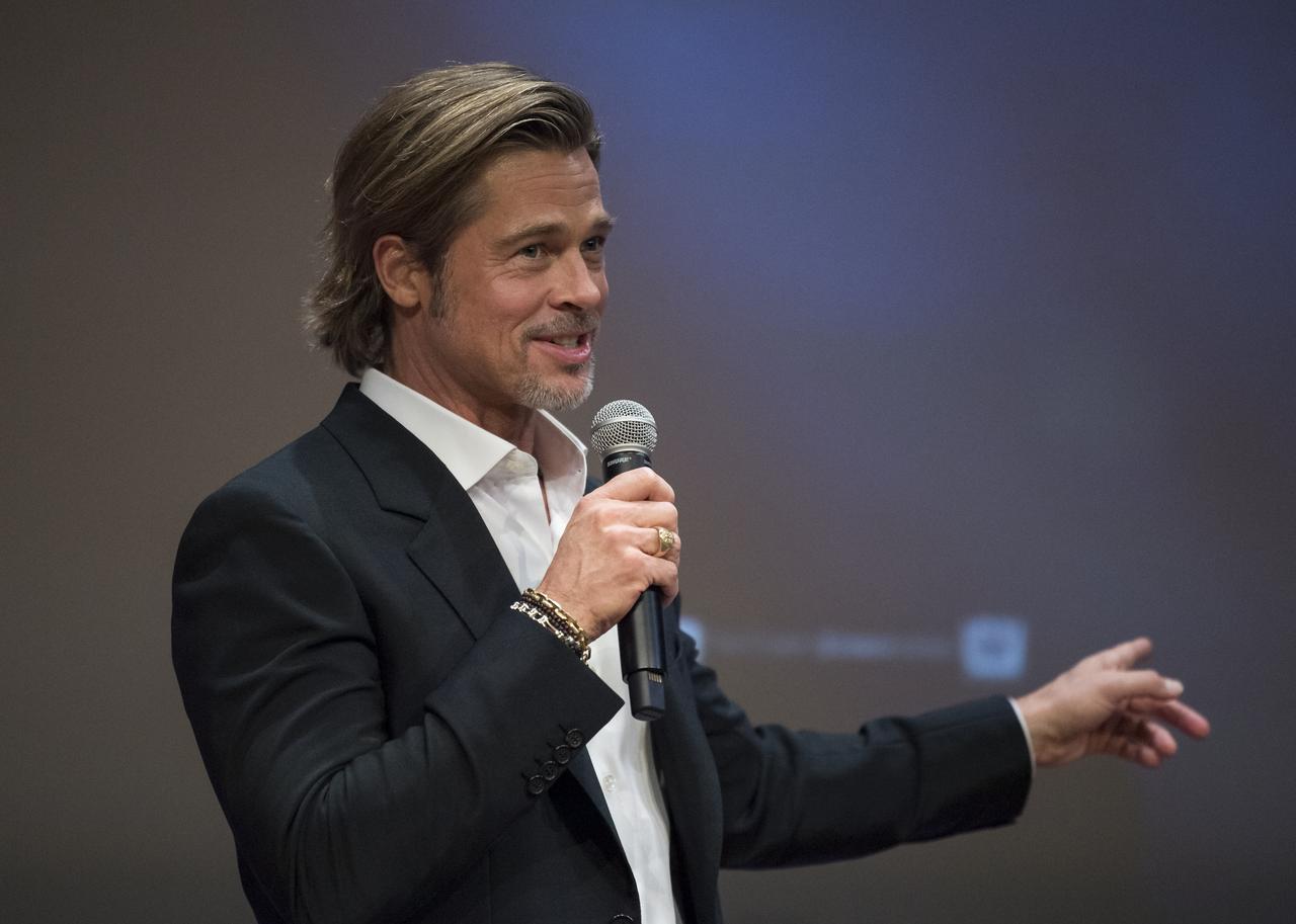 Actor Brad Pitt speaks before a screening of the film "Ad Astra" at National Geographic Society, Monday, September 16, 2019 in Washington. The film was produced, co-written, and directed by James Gray and stars Pitt, Tommy Lee Jones, Ruth Negga, Liv Tyler, and Donald Sutherland. Pitt stars as astronaut Roy McBride who travels deep into the solar system in hopes of solving a mystery that threatens life on Earth. Photo Credit: (NASA/Aubrey Gemignani)