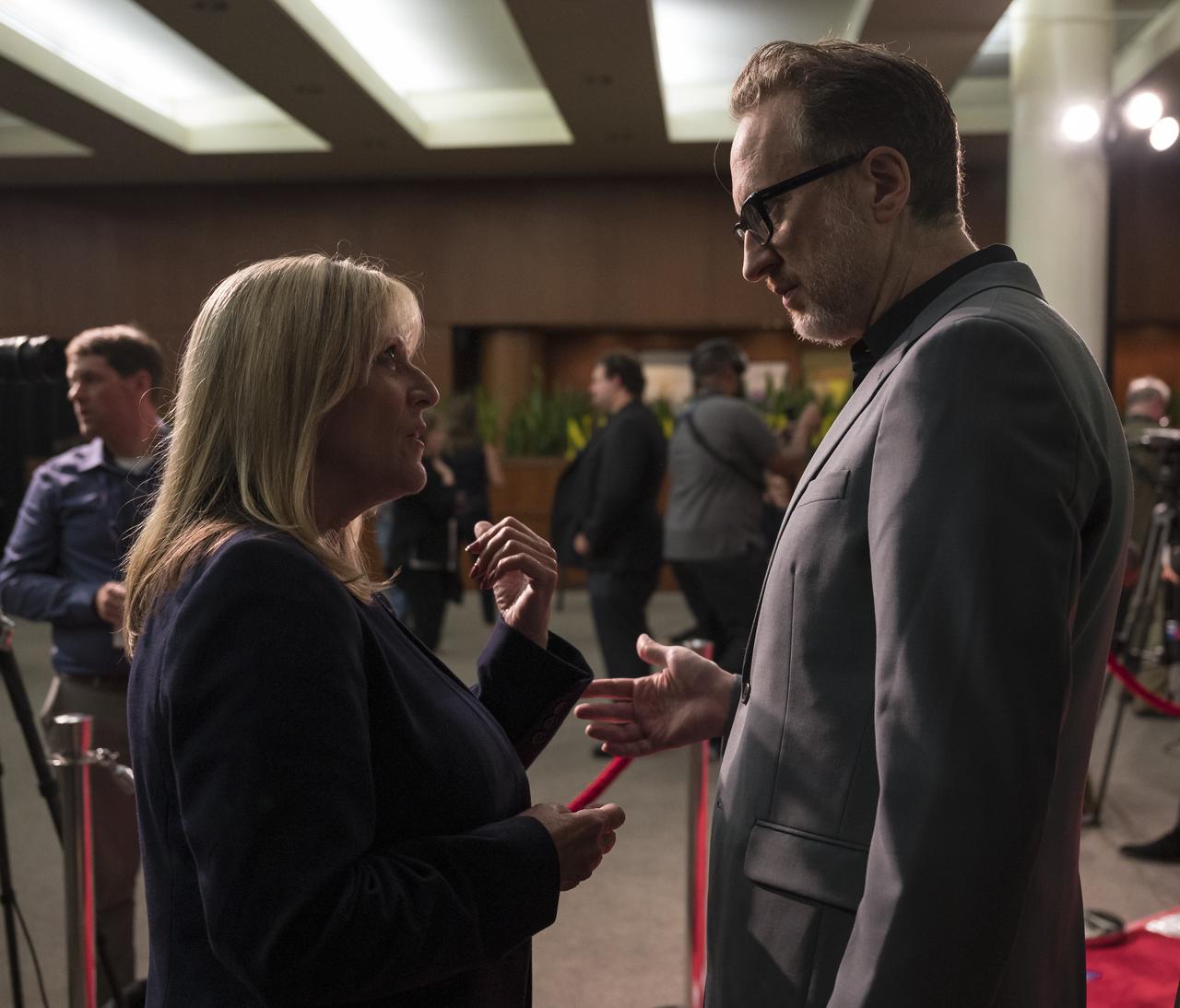 Former NASA astronaut Kay Hire, left, speaks with film producer, co-writer, and director James Gray at a screening of "Ad Astra" at National Geographic Society, Monday, September 16, 2019 in Washington. It stars Tommy Lee Jones, Brad Pitt, Ruth Negga, Liv Tyler, and Donald Sutherland. Pitt stars as astronaut Roy McBride who travels deep into the solar system in hopes of solving a mystery that threatens life on Earth. Photo Credit: (NASA/Aubrey Gemignani)
