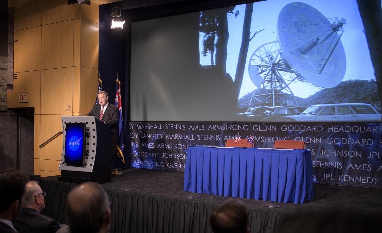 An image of the former Honeysuckle Creek Tracking Station near Canberra, Australia is seen on screen as NASA Deputy Administrator Jim Morhard delivers remarks prior the signing of a letter of intent between NASA and the Australian Space Agency, Saturday, Sept. 21, 2019 at NASA Headquarters in Washington. NASA and the Australian Space Agency will build on over 60 years of collaboration in space exploration between the two countries and commit to expanding cooperation. Photo Credit: (NASA/Joel Kowsky)
