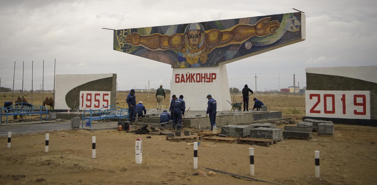 A mosaic sign welcoming visitors is seen outside the town of Baikonur, Kazakhstan, Sunday, Sept. 22, 2019 in Baikonur, Kazakhstan. Expedition 61 crewmembers Jessica Meir of NASA and Oleg Skripochka of Roscosmos, and spaceflight participant Hazzaa Ali Almansoori of the United Arab Emirates will launch September 25th on the Soyuz MS-15 spacecraft from the Baikonur Cosmodrome to the International Space Station. Photo Credit: (NASA/Bill Ingalls)