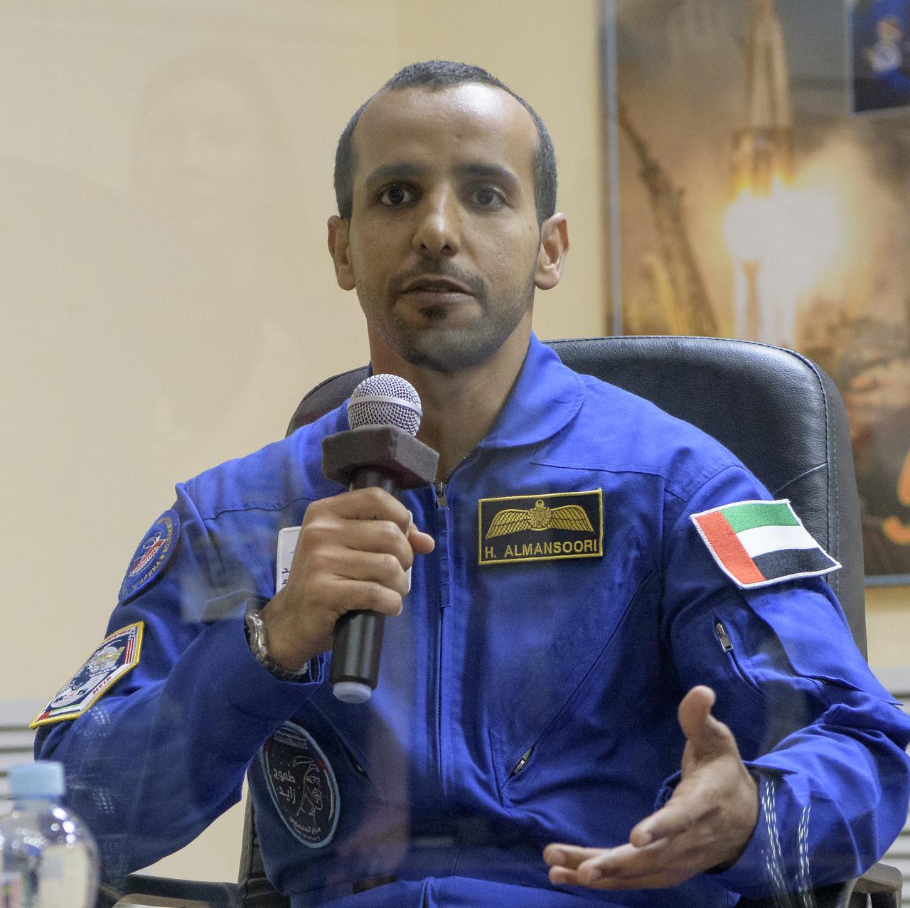 Spaceflight participant Hazzaa Ali Almansoori of the United Arab Emirates is seen during a press conference, Tuesday, Sept. 24, 2019 at the Cosmonaut Hotel in Baikonur, Kazakhstan. Almansoori, Expedition 61 cosmonaut Oleg Skripochka of Roscosmos and Jessica Meir of NASA will launch September 25th on the Soyuz MS-15 spacecraft from the Baikonur Cosmodrome to the International Space Station. Photo Credit: (NASA/Bill Ingalls)