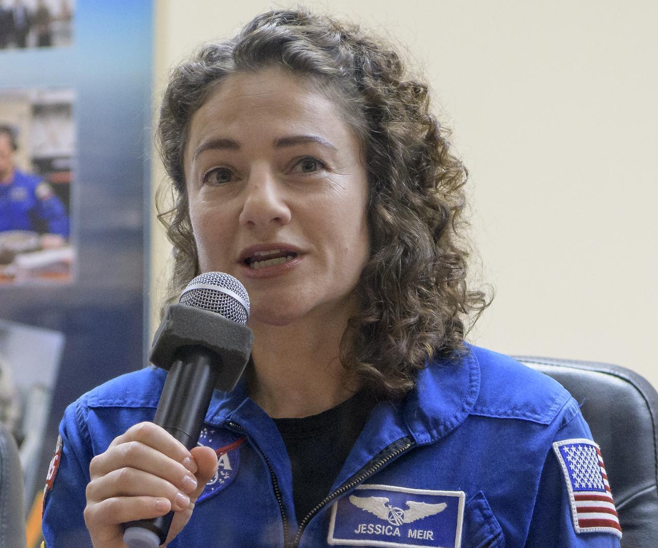 Expedition 61 astronaut Jessica Meir of NASA is seen during a press conference, Tuesday, Sept. 24, 2019 at the Cosmonaut Hotel in Baikonur, Kazakhstan. Meir, Expedition 61 cosmonaut Oleg Skripochka of Roscosmos and spaceflight participant Hazzaa Ali Almansoori of the United Arab Emirates will launch September 25th on the Soyuz MS-15 spacecraft from the Baikonur Cosmodrome to the International Space Station. Photo Credit: (NASA/Bill Ingalls)