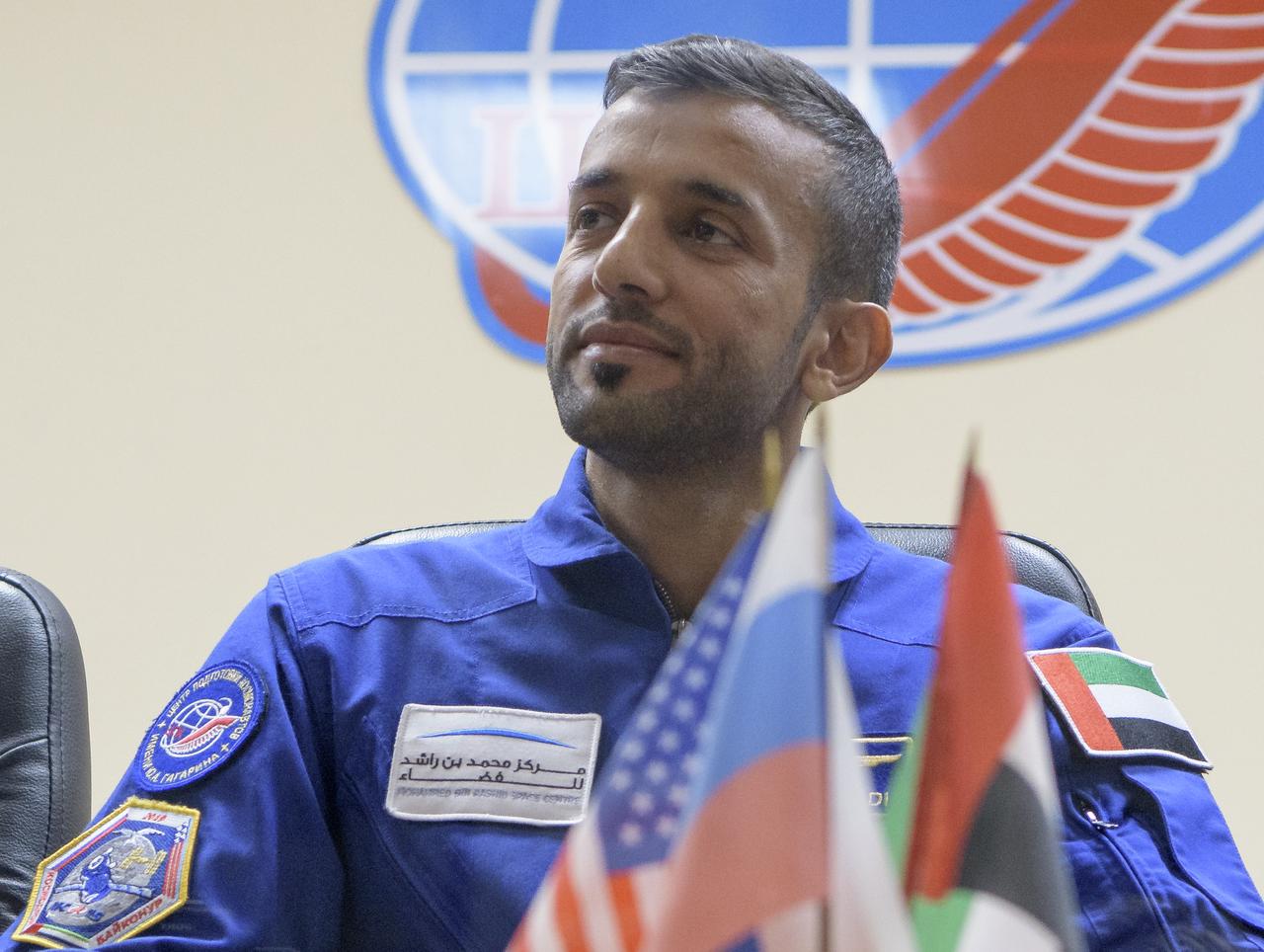 Backup spaceflight participant Sultan Al-Neyadi of the United Arab Emirates is seen during a press conference, Tuesday, Sept. 24, 2019 at the Cosmonaut Hotel in  Baikonur, Kazakhstan. spaceflight participant Hazzaa Ali Almansoori of the United Arab Emirates, Expedition 61 cosmonaut Oleg Skripochka of Roscosmos and Jessica Meir of NASA will launch September 25th on the Soyuz MS-15 spacecraft from the Baikonur Cosmodrome to the International Space Station. Photo Credit: (NASA/Bill Ingalls)
