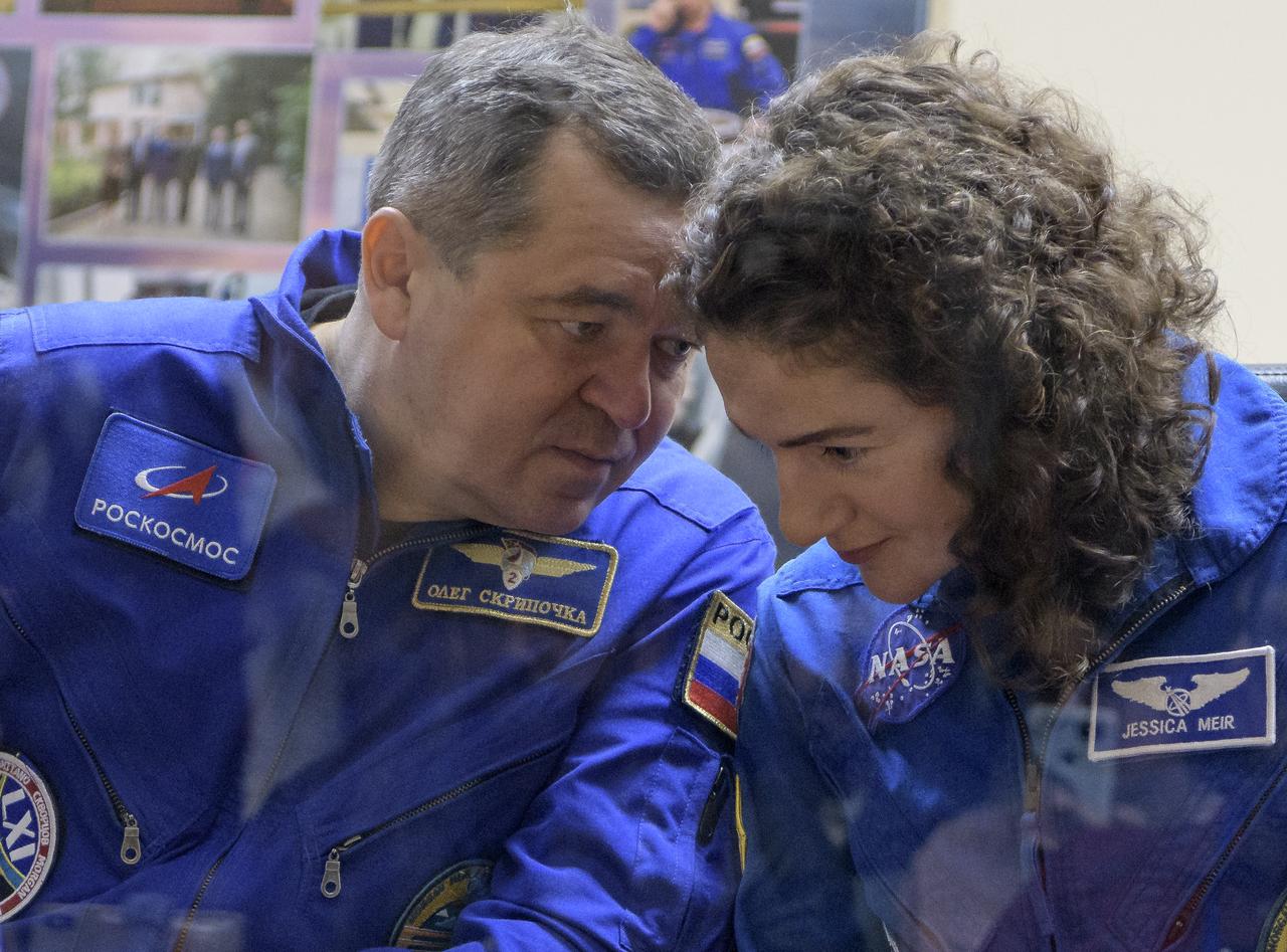 Expedition 61 cosmonaut Oleg Skripochka of Roscosmos and Jessica Meir of NASA are seen during a press conference, Tuesday, Sept. 24, 2019 at the Cosmonaut Hotel in  Baikonur, Kazakhstan. Meir, Skripochka, and Almansoori will launch September 25th on the Soyuz MS-15 spacecraft from the Baikonur Cosmodrome to the International Space Station. Photo Credit: (NASA/Bill Ingalls)