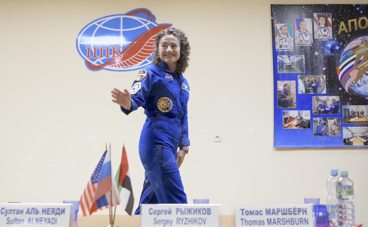 Expedition 61 astronaut Jessica Meir of NASA waves as she departs a press conference, Tuesday, Sept. 24, 2019 at the Cosmonaut Hotel in Baikonur, Kazakhstan. Meir, Expedition 61 cosmonaut Oleg Skripochka of Roscosmos and spaceflight participant Hazzaa Ali Almansoori of the United Arab Emirates will launch September 25th on the Soyuz MS-15 spacecraft from the Baikonur Cosmodrome to the International Space Station. Photo Credit: (NASA/Bill Ingalls)