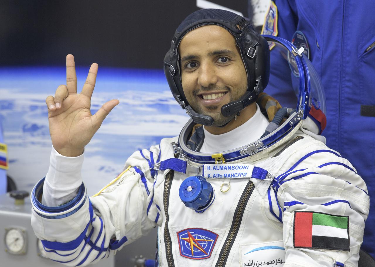 Spaceflight participant Hazzaa Ali Almansoori of the United Arab Emirates waits to have his Sokol suit pressure checked a few hours ahead of his launch on a Soyuz rocket with Expedition 61 crewmembers Jessica Meir of NASA and Oleg Skripochka of Roscosmos, Wednesday, Sept. 25, 2019 at the Baikonur Cosmodrome in Kazakhstan. Meir, Skripochka, and Almansoori will launch on the Soyuz MS-15 spacecraft from the Baikonur Cosmodrome to the International Space Station. Photo Credit: (NASA/Bill Ingalls)