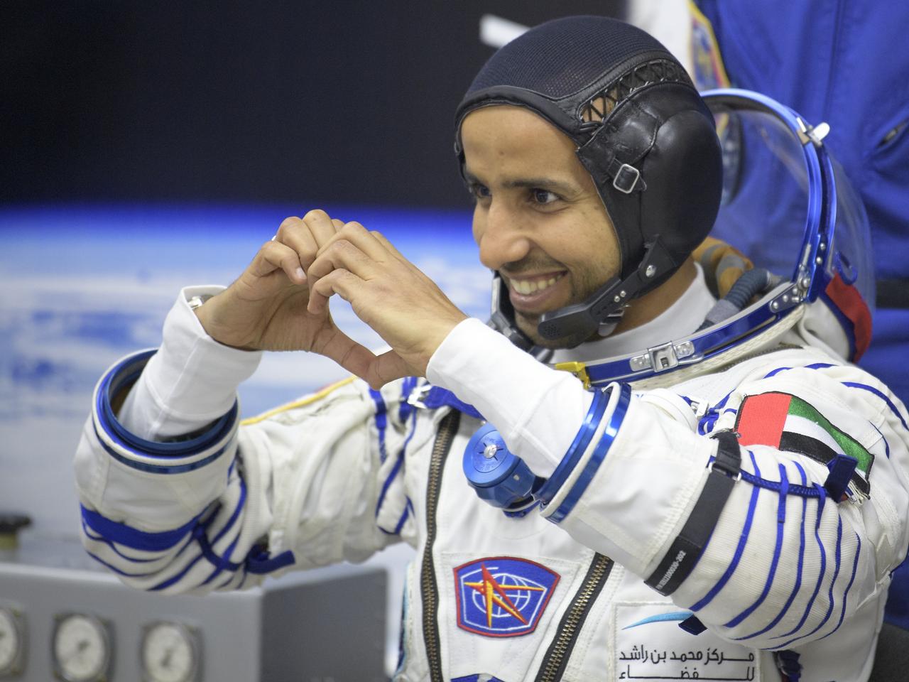 Spaceflight participant Hazzaa Ali Almansoori of the United Arab Emirates waits to have his Sokol suit pressure checked a few hours ahead of his launch on a Soyuz rocket with Expedition 61 crewmembers Jessica Meir of NASA and Oleg Skripochka of Roscosmos, Wednesday, Sept. 25, 2019 at the Baikonur Cosmodrome in Kazakhstan. Meir, Skripochka, and Almansoori will launch on the Soyuz MS-15 spacecraft from the Baikonur Cosmodrome to the International Space Station. Photo Credit: (NASA/Bill Ingalls)
