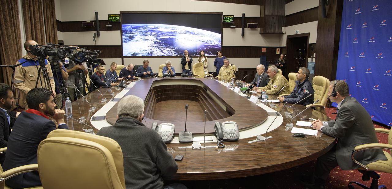 NASA acting Associate Administrator for Human Exploration and Operations Mission Directorate Kenneth Bowersox, Roscosmos Director General Dmitry Rogozin, and UAE Space Agency Chairman Ahmad Belhoul give remarks during a post launch press conference, Thursday, Sept. 26, 2019 at the Baikonur Hotel Hotel in Baikonur, Kazakhstan. A few hours earlier the Soyuz MS-15 spacecraft successfully launched from the Baikonur Cosmodrome with Expedition 61 crewmembers Jessica Meir of NASA and Oleg Skripochka of Roscosmos, and spaceflight participant Hazzaa Ali Almansoori of the United Arab Emirates. Photo Credit: (NASA/Bill Ingalls)