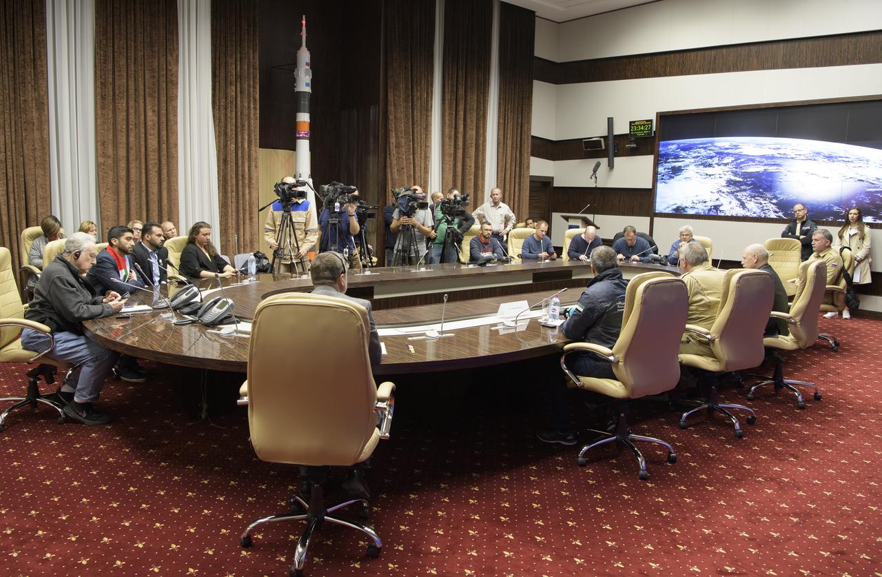 NASA acting Associate Administrator for Human Exploration and Operations Mission Directorate Kenneth Bowersox, Roscosmos Director General Dmitry Rogozin, and UAE Space Agency Chairman Ahmad Belhoul give remarks during a post launch press conference, Thursday, Sept. 26, 2019 at the Baikonur Hotel Hotel in Baikonur, Kazakhstan. A few hours earlier the Soyuz MS-15 spacecraft successfully launched from the Baikonur Cosmodrome with Expedition 61 crewmembers Jessica Meir of NASA and Oleg Skripochka of Roscosmos, and spaceflight participant Hazzaa Ali Almansoori of the United Arab Emirates. Photo Credit: (NASA/Bill Ingalls)