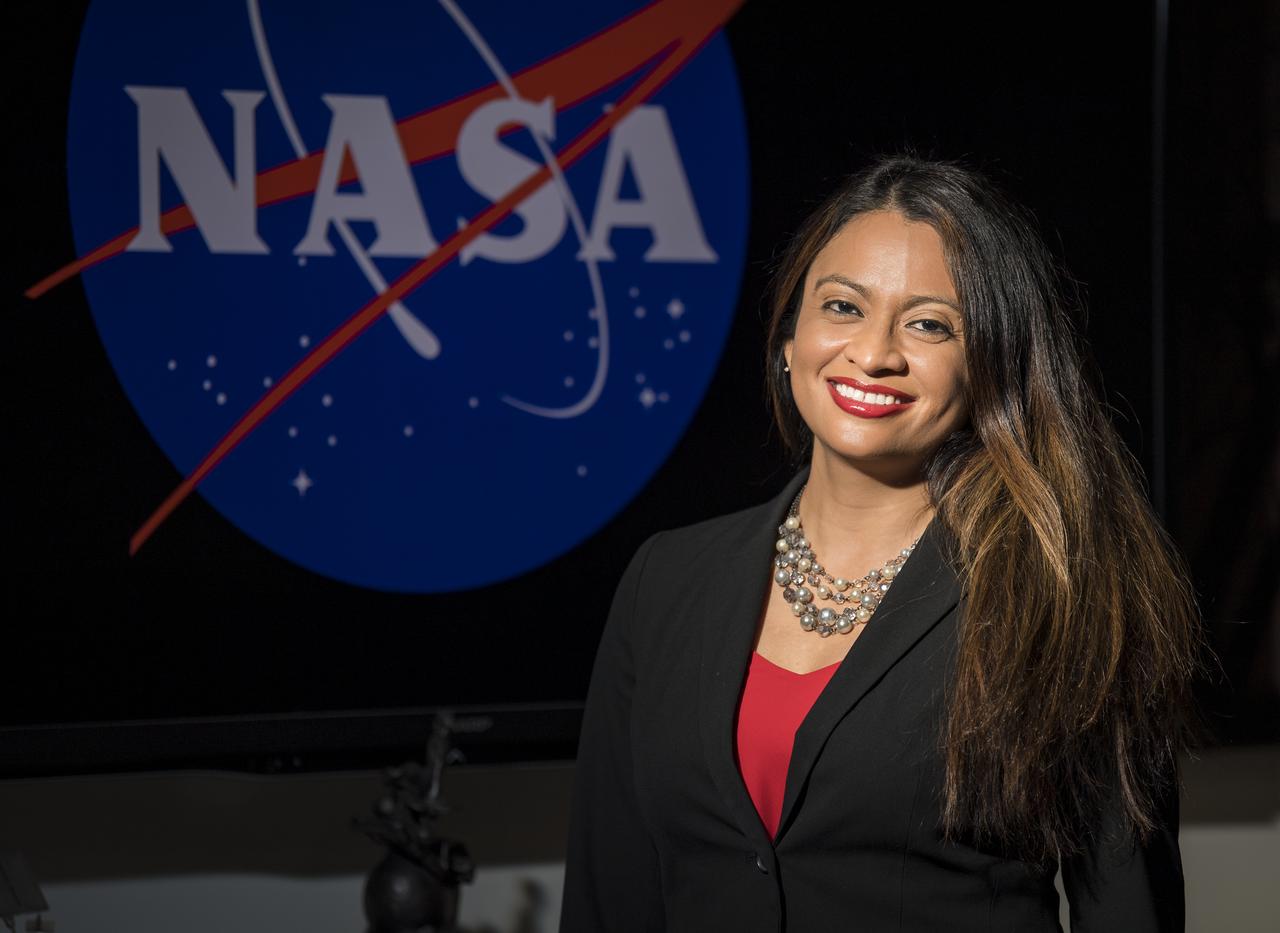 "For me, representation is key. I want people from different backgrounds, different experiences, and different races and ethnicities to see themselves at this agency and across federal government, which is supposed to be representative of the American population. Especially for little girls like me — I grew up poor, the daughter of a former migrant worker. I grew up working in the fields, picking fruits and vegetables during weekends and school breaks.  "I’m the first one in my family to get a four-year degree. I didn’t do it because it was what I was expected to do or because it was the obvious next step. I was able to go because I had teachers and advisors who saw potential even when I couldn’t. I was a first generation college student, and now I have nieces and nephews who have obtained or are in the process of obtaining their education."  "It’s not only about opening doors, it’s about opening minds — giving people a vision of the possibilities that are out there. Because now you’re broadening that thinking. You’re helping them question their status quo and helping them to see a different version of themselves. When you meet someone who is doing something different but yet, you can relate to them because of what they look like or their background, it makes a huge difference." Portrait, Maria Santos, Tuesday, Oct.1, 2019 at NASA Headquarters in Washington. Photo Credit: (NASA/Aubrey Gemignani)