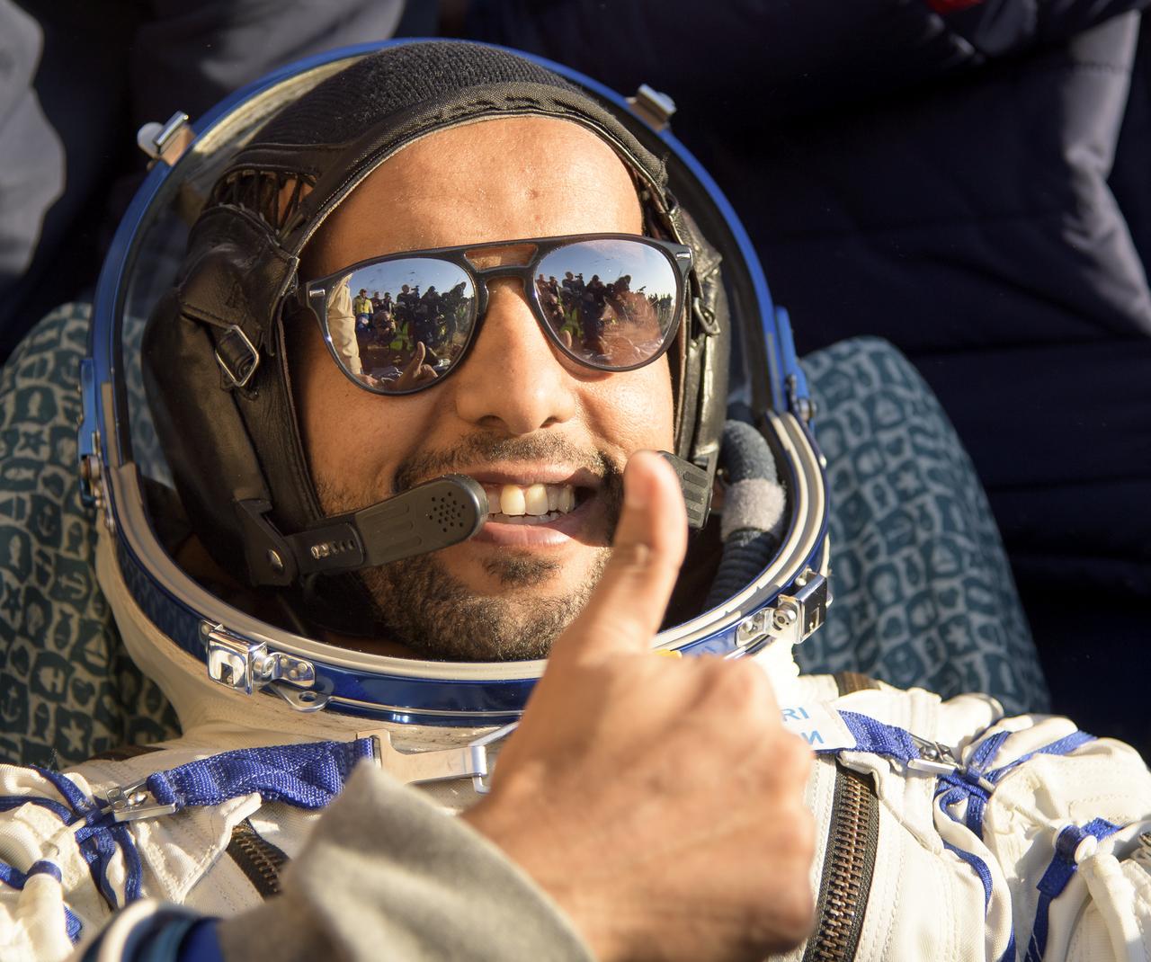 Visiting astronaut Hazzaa Ali Almansoori of the United Arab Emirates is seen outside the Soyuz MS-12 spacecraft after he landed with Expedition 60 crewmembers Nick Hague of NASA and Alexey Ovchinin of Roscosmos in a remote area near the town of Zhezkazgan, Kazakhstan on Thursday, Oct. 3, 2019. Hague and Ovchinin are returning after 203 days in space where they served as members of the Expedition 59 and 60 crews onboard the International Space Station. Almansoori logged 8 days in space during his first flight as an astronaut. Photo Credit: (NASA/Bill Ingalls)