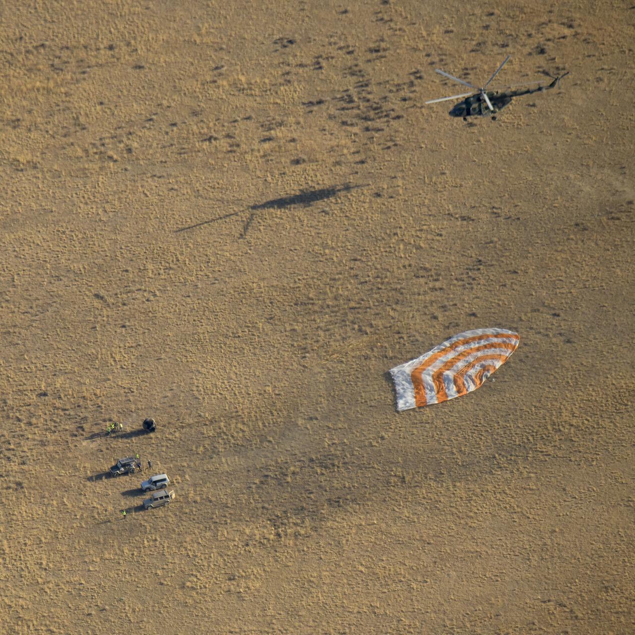 Russian Search and Rescue teams arrive at the Soyuz MS-12 spacecraft shortly after it landed with Expedition 60 crew members Nick Hague of NASA and Alexey Ovchinin of Roscosmos, along with visiting astronaut Hazzaa Ali Almansoori of the United Arab Emirates, Thursday, Oct. 3, 2019. Hague and Ovchinin are returning after 203 days in space where they served as members of the Expedition 59 and 60 crews onboard the International Space Station. Almansoori logged 8 days in space during his first flight as an astronaut. Photo Credit: (NASA/Bill Ingalls)