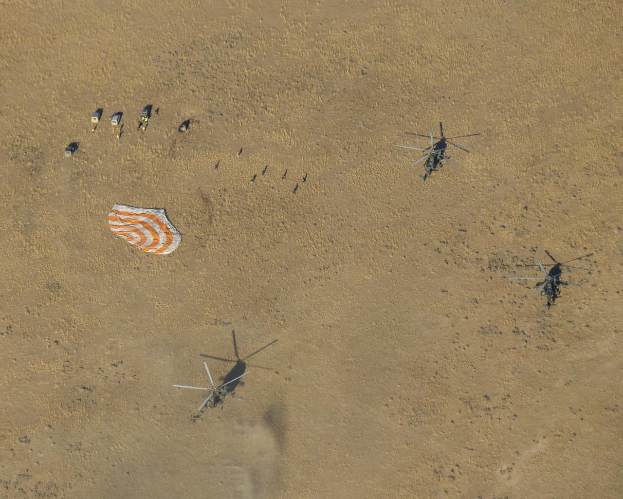 Russian Search and Rescue teams arrive at the Soyuz MS-12 spacecraft shortly after it landed with Expedition 60 crew members Nick Hague of NASA and Alexey Ovchinin of Roscosmos, along with visiting astronaut Hazzaa Ali Almansoori of the United Arab Emirates, Thursday, Oct. 3, 2019. Hague and Ovchinin are returning after 203 days in space where they served as members of the Expedition 59 and 60 crews onboard the International Space Station. Almansoori logged 8 days in space during his first flight as an astronaut. Photo Credit: (NASA/Bill Ingalls)
