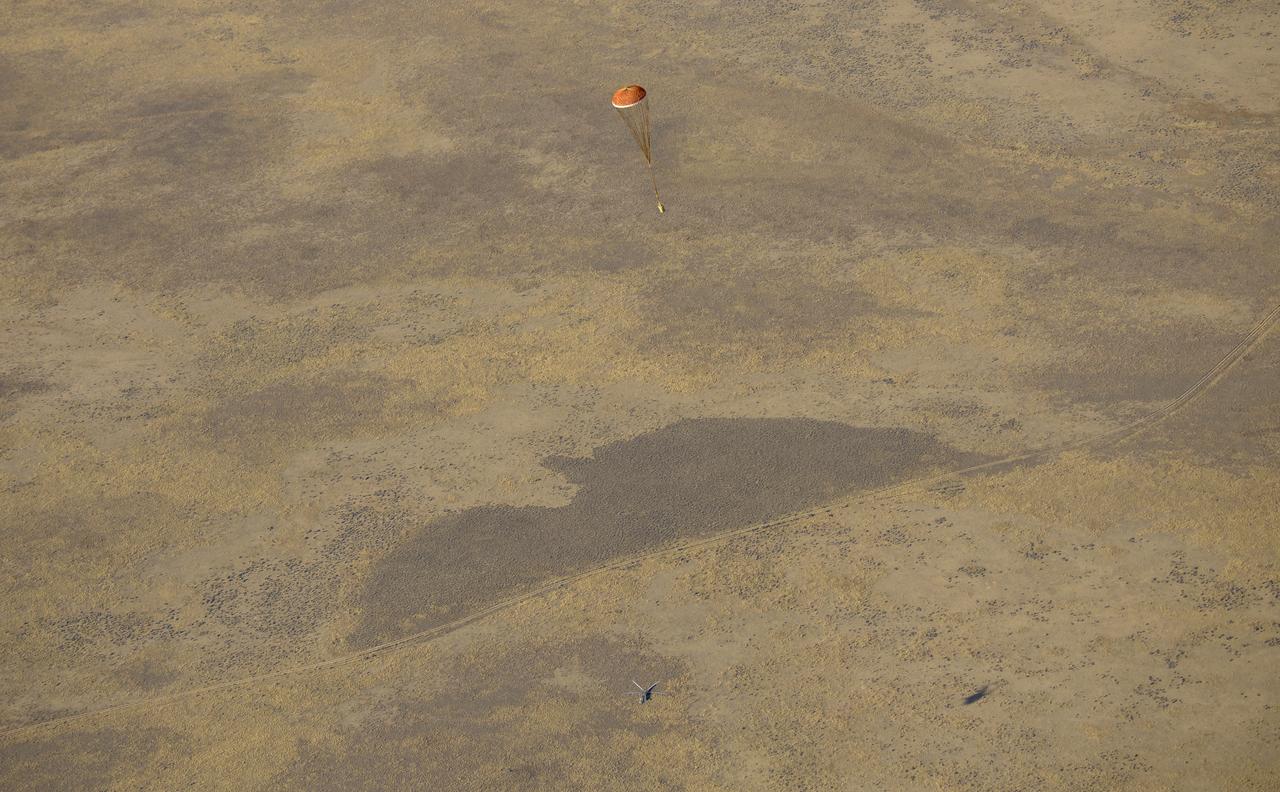 The drogue parachute of the Soyuz MS-12 spacecraft is seen coming down after the capsule landed with Expedition 60 crew members Nick Hague of NASA and Alexey Ovchinin of Roscosmos, along with visiting astronaut Hazzaa Ali Almansoori of the United Arab Emirates, Thursday, Oct. 3, 2019. Hague and Ovchinin are returning after 203 days in space where they served as members of the Expedition 59 and 60 crews onboard the International Space Station. Almansoori logged 8 days in space during his first flight as an astronaut. Photo Credit: (NASA/Bill Ingalls)