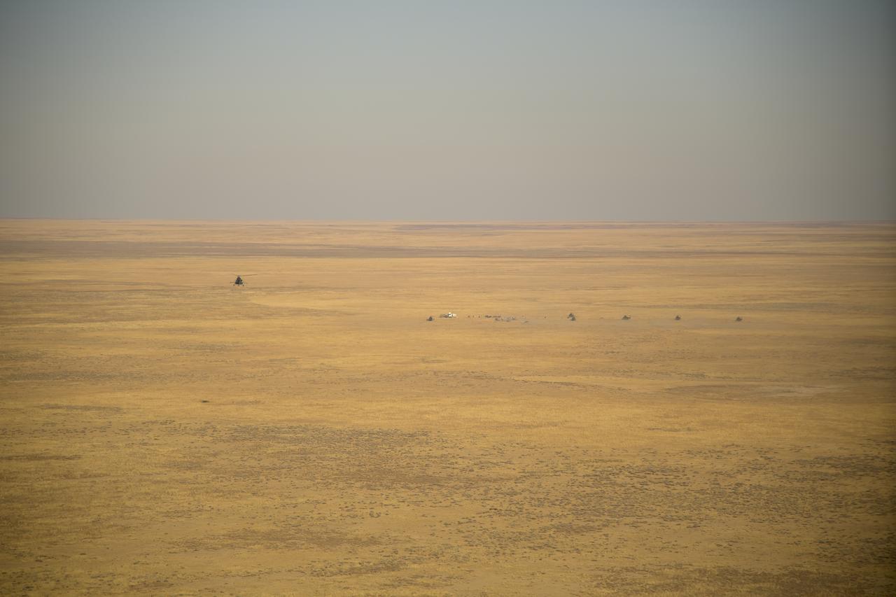 Russian Search and Rescue teams arrive at the Soyuz MS-12 spacecraft shortly after it landed with Expedition 60 crew members Nick Hague of NASA and Alexey Ovchinin of Roscosmos, along with visiting astronaut Hazzaa Ali Almansoori of the United Arab Emirates, Thursday, Oct. 3, 2019. Hague and Ovchinin are returning after 203 days in space where they served as members of the Expedition 59 and 60 crews onboard the International Space Station. Almansoori logged 8 days in space during his first flight as an astronaut. Photo Credit: (NASA/Bill Ingalls)
