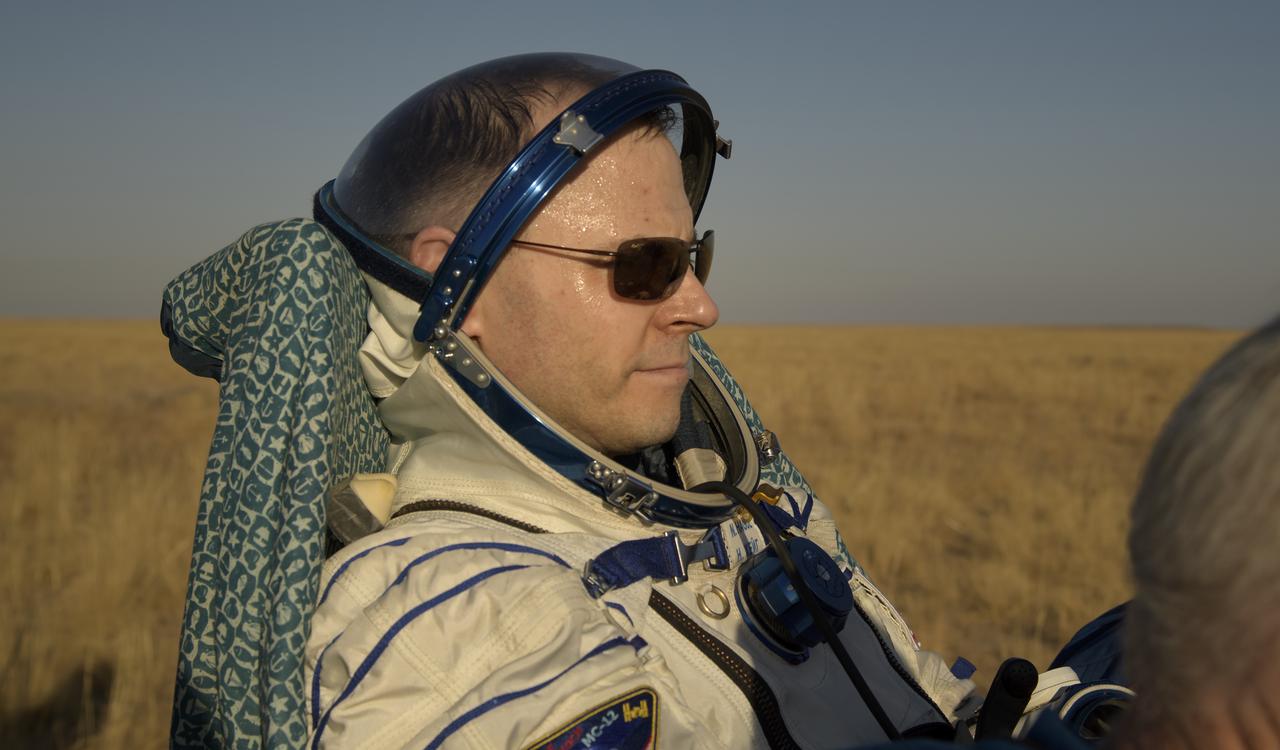 Expedition 60 crewmember Nick Hague of NASA is carried to a medical tent after he and fellow Expedition 60 crewmember Alexey Ovchinin of Roscosmos and visiting astronaut Hazzaa Ali Almansoori of the United Arab Emirates landed in their Soyuz MS-12 spacecraft near the town of Zhezkazgan, Kazakhstan on Thursday, Oct. 3, 2019. Hague and Ovchinin are returning after 203 days in space where they served as members of the Expedition 59 and 60 crews onboard the International Space Station. Almansoori logged 8 days in space during his first flight as an astronaut. Photo Credit: (NASA/Bill Ingalls)