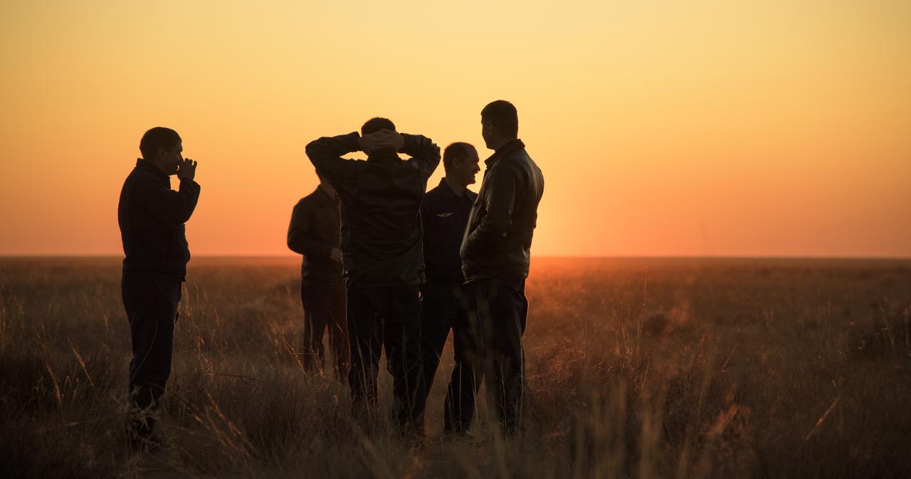 Supports teams wait to depart the Soyuz MS-12 spacecraft landing site after the capsule landed with Expedition 60 crew members Nick Hague of NASA and Alexey Ovchinin of Roscosmos, along with visiting astronaut Hazzaa Ali Almansoori of the United Arab Emirates in a remote area near the town of Zhezkazgan, Kazakhstan, Thursday, Oct. 3, 2019. Hague and Ovchinin are returning after 203 days in space where they served as members of the Expedition 59 and 60 crews onboard the International Space Station. Almansoori logged 8 days in space during his first flight as an astronaut. Photo Credit: (NASA/Bill Ingalls)