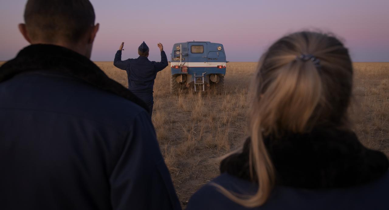 An all-terrain vehicle, with Expedition 60 crewmember Nick Hague of NASA onboard, is backed up to an awaiting helicopter after Hague landed in the Soyuz MS-12 spacecraft with Expedition 60 crewmember Alexey Ovchinin of Roscosmos, and visiting astronaut Hazzaa Ali Almansoori of the United Arab Emirates in a remote area near the town of Zhezkazgan, Kazakhstan, Thursday, Oct. 3, 2019. Hague and Ovchinin are returning after 203 days in space where they served as members of the Expedition 59 and 60 crews onboard the International Space Station. Almansoori logged 8 days in space during his first flight as an astronaut. Photo Credit: (NASA/Bill Ingalls)