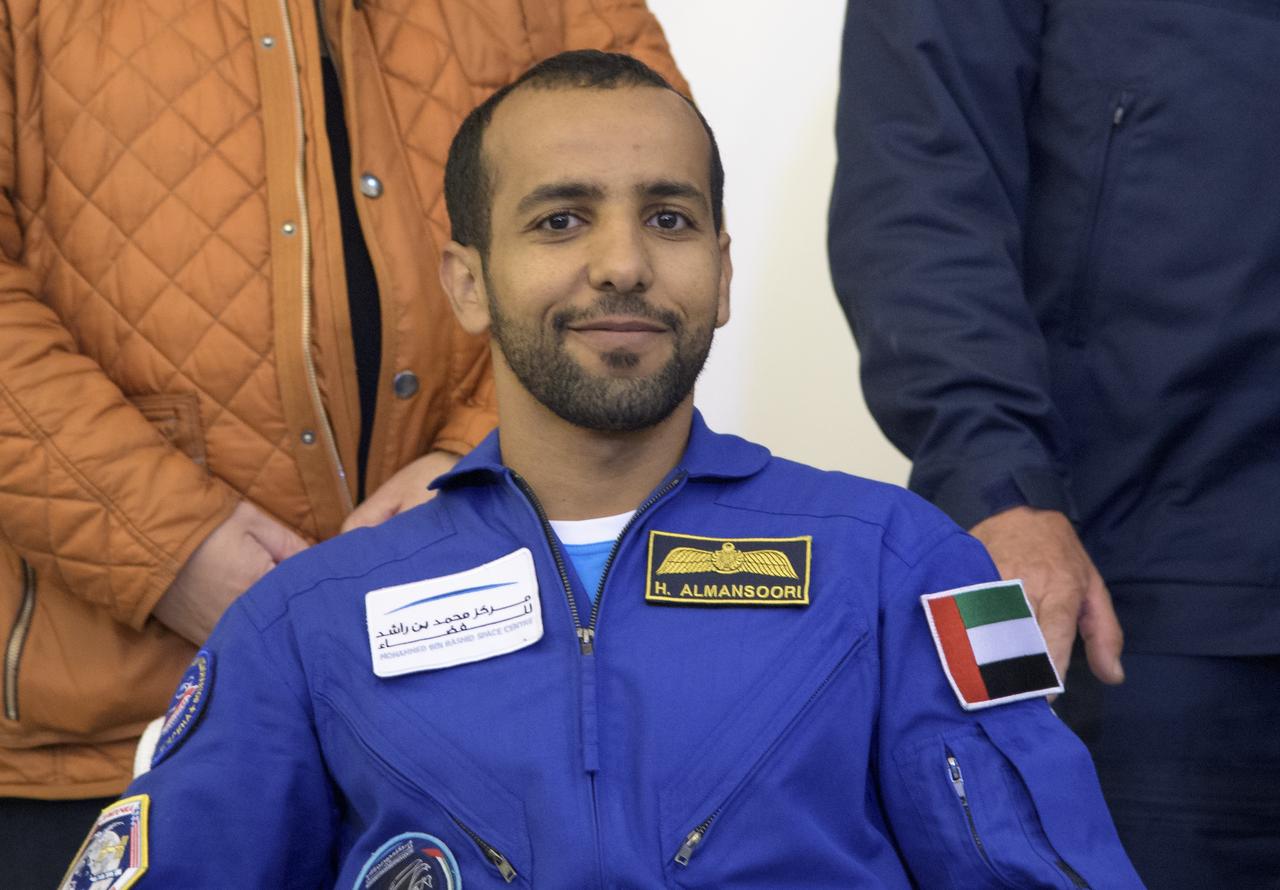 Visiting astronaut Hazzaa Ali Almansoori of the United Arab Emirates attends a Karaganda Airport welcome ceremony in Kazakhstan on Thursday, Oct. 3, 2019. Expedition 60 crewmembers Alexey Ovchinin of Roscosmos and Nick Hague of NASA are returning after 203 days in space where they served as members of the Expedition 59 and 60 crews onboard the International Space Station. Almansoori logged 8 days in space during his first flight as an astronaut. Photo Credit: (NASA/Bill Ingalls)