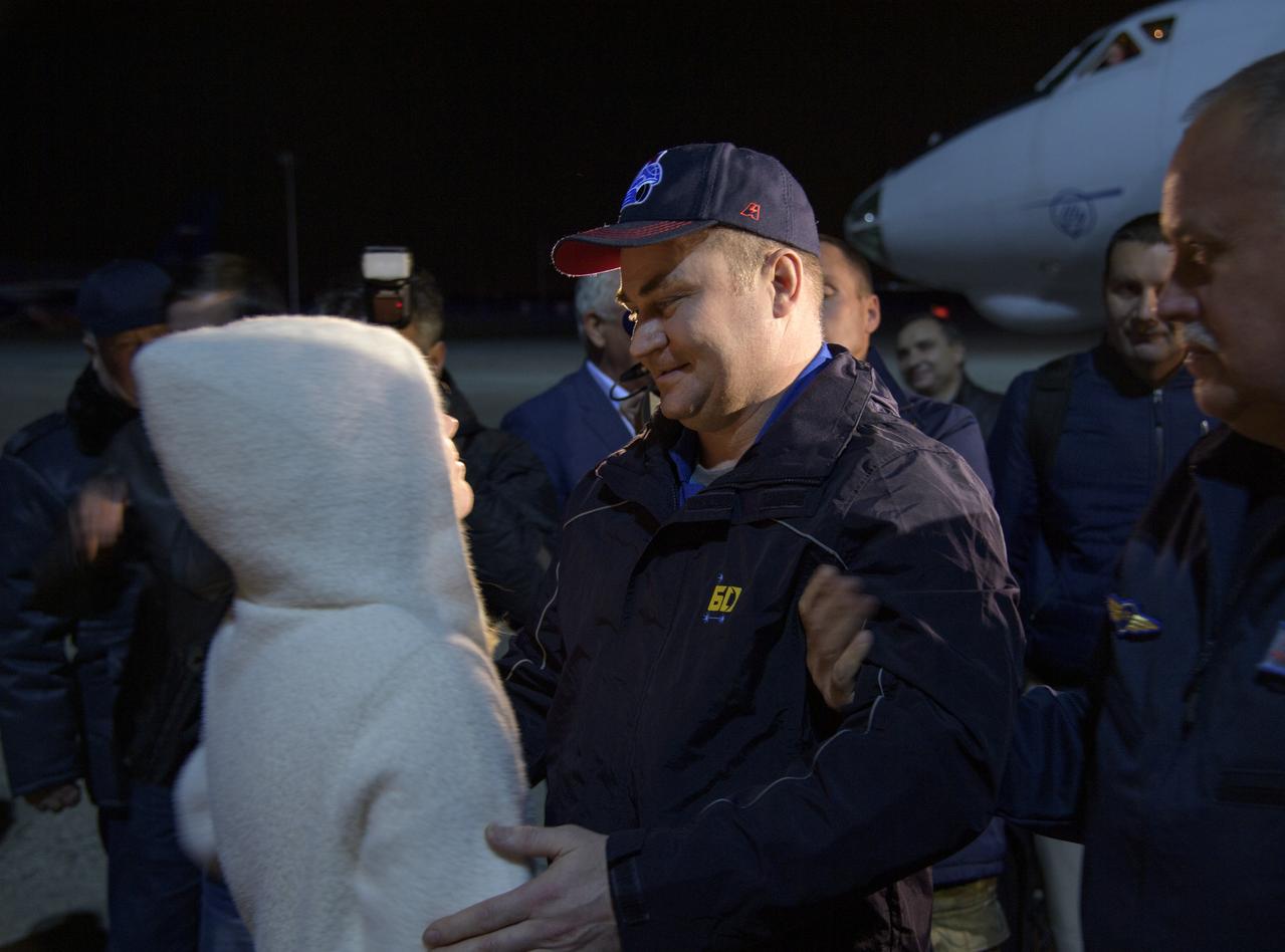 \Expedition 60 cosmonaut Alexey Ovchinin of Roscosmos is welcomed home by his daughter, Friday, Oct. 4, 2019 in Star City, Russia. Ovchinin returned after 203 days in space with NASA astronaut Nick Hague where they served as members of the Expedition 59 and 60 crews onboard the International Space Station. Also returning was Hazzaa Ali Almansoori who logged 8 days in space during his first flight as an astronaut. Photo Credit: (NASA/Bill Ingalls)
