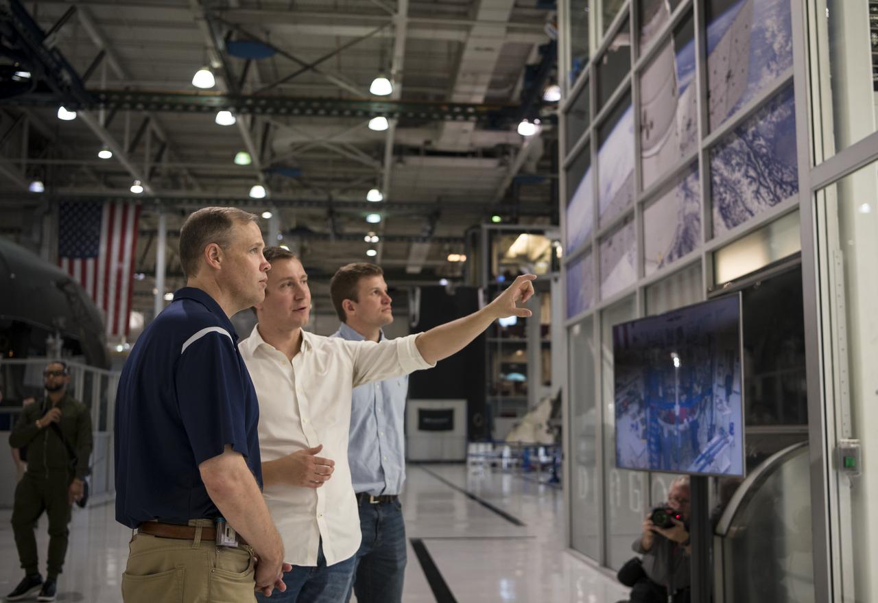 NASA Administrator Jim Bridenstine, right, speaks to Joseph Petrzelka of SpaceX about the Dragon capsule that will launch during the Demo-2 mission while on a tour of the SpaceX Headquarters, Thursday, Oct. 10, 2019 in Hawthorne, CA. Photo credit: (NASA/Aubrey Gemignani)