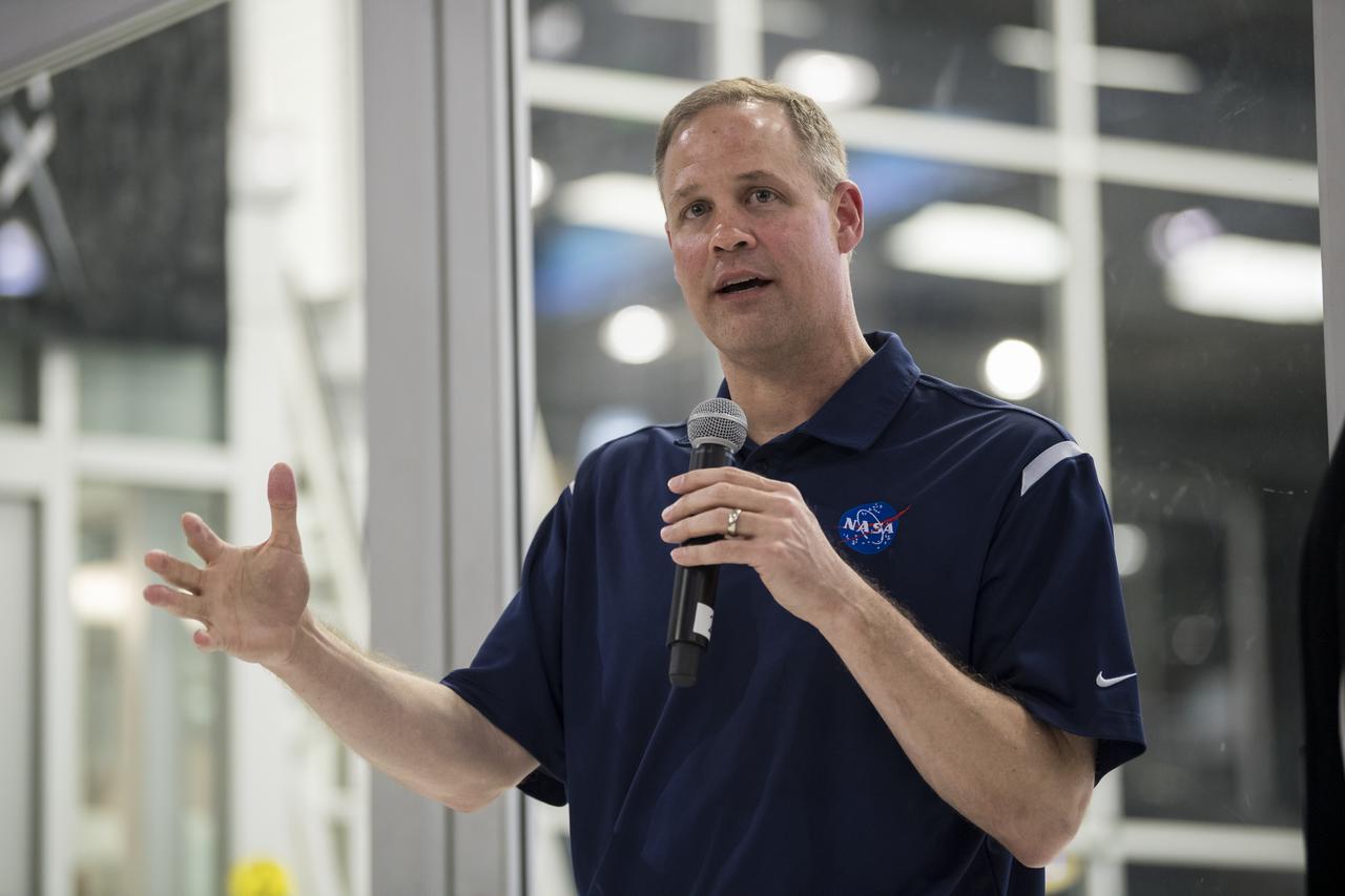 NASA Administrator Jim Bridenstine answers a question from the press in front of the Crew Dragon that is being prepared for the Demo-2 mission, at SpaceX Headquarters, Thursday, Oct. 10, 2019 in Hawthorne, CA. Photo credit: (NASA/Aubrey Gemignani)