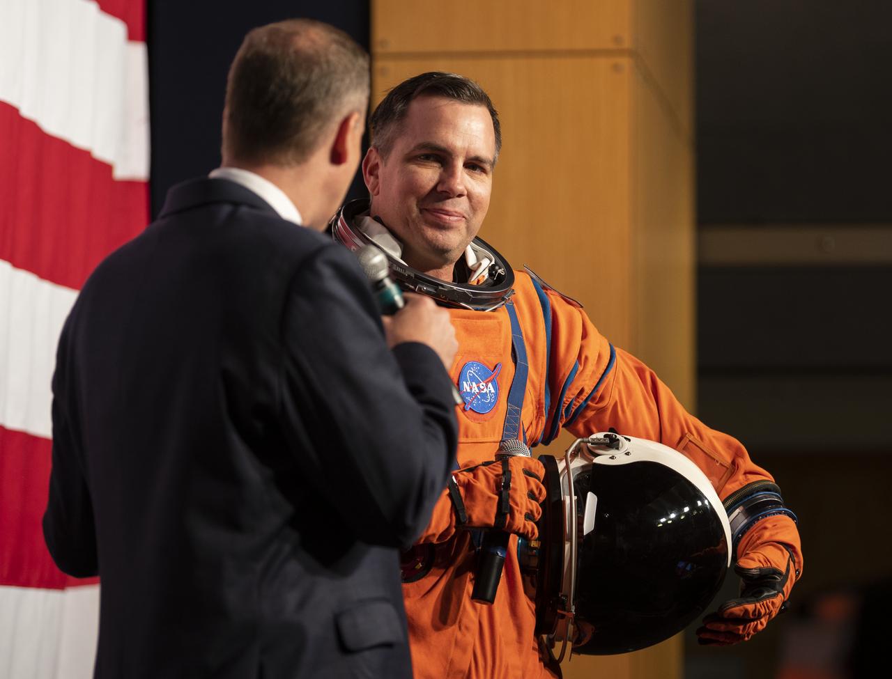 NASA Administrator Jim Bridenstine, left, speaks with Dustin Gohmert, Orion Crew Survival Systems Project Manager at NASA’s Johnson Space Center, wearing the Orion Crew Survival System suit, about the suit, Tuesday, Oct. 15, 2019 at NASA Headquarters in Washington. The Orion suit is designed for a custom fit and incorporates safety technology and mobility features that will help protect astronauts on launch day, in emergency situations, high-risk parts of missions near the Moon, and during the high-speed return to Earth.  Photo Credit: (NASA/Joel Kowsky)