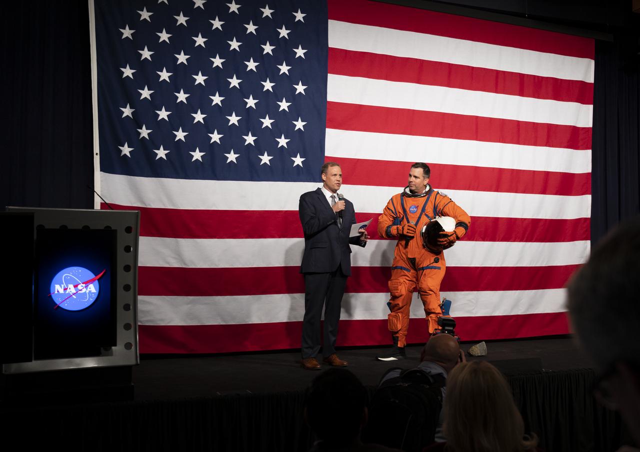 NASA Administrator Jim Bridenstine, left, speaks with Dustin Gohmert, Orion Crew Survival Systems Project Manager at NASA’s Johnson Space Center, wearing the Orion Crew Survival System suit, about the suit, Tuesday, Oct. 15, 2019 at NASA Headquarters in Washington. The Orion suit is designed for a custom fit and incorporates safety technology and mobility features that will help protect astronauts on launch day, in emergency situations, high-risk parts of missions near the Moon, and during the high-speed return to Earth.  Photo Credit: (NASA/Joel Kowsky)